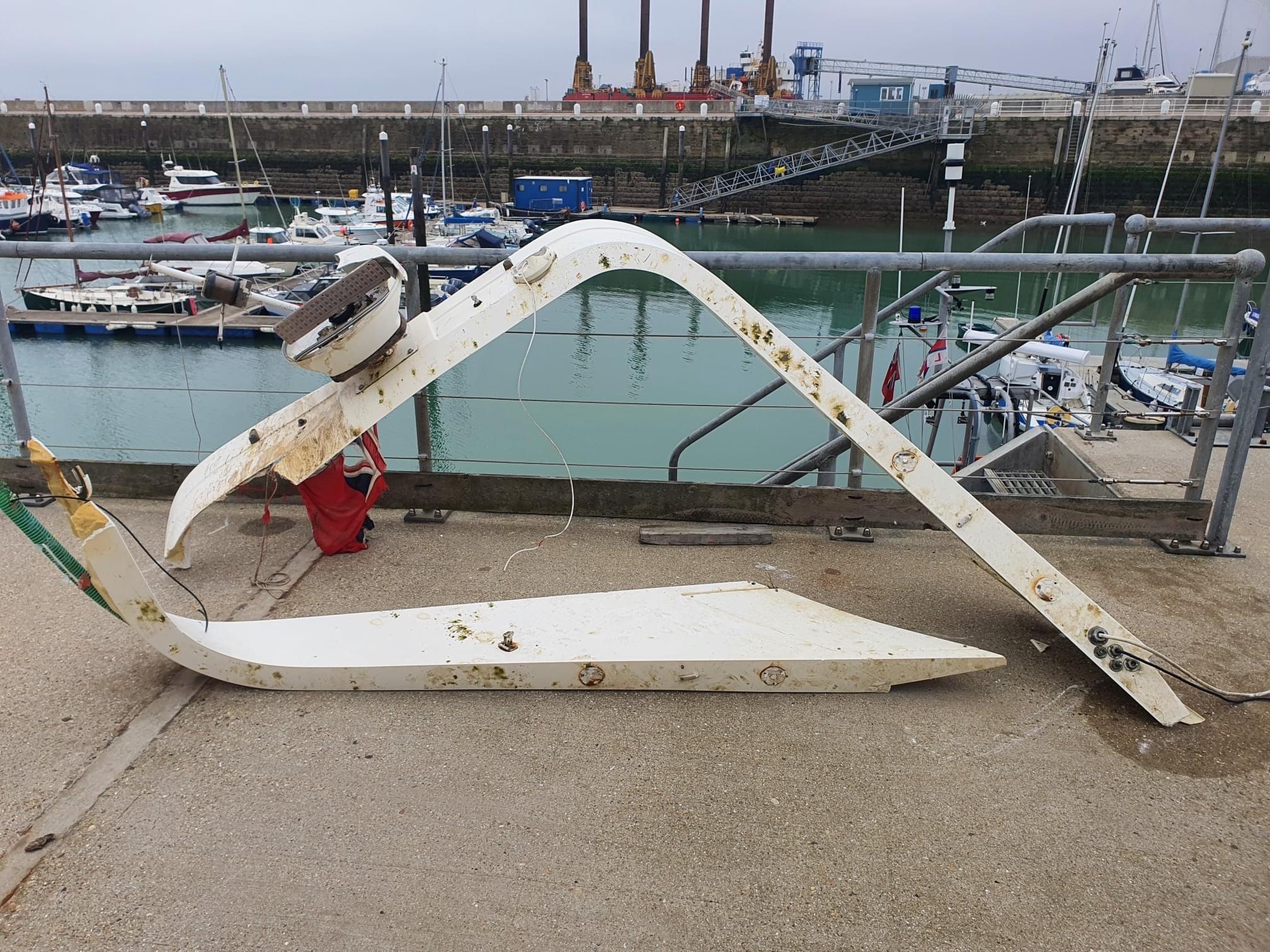 Part of the flybridge lying on the ground. 