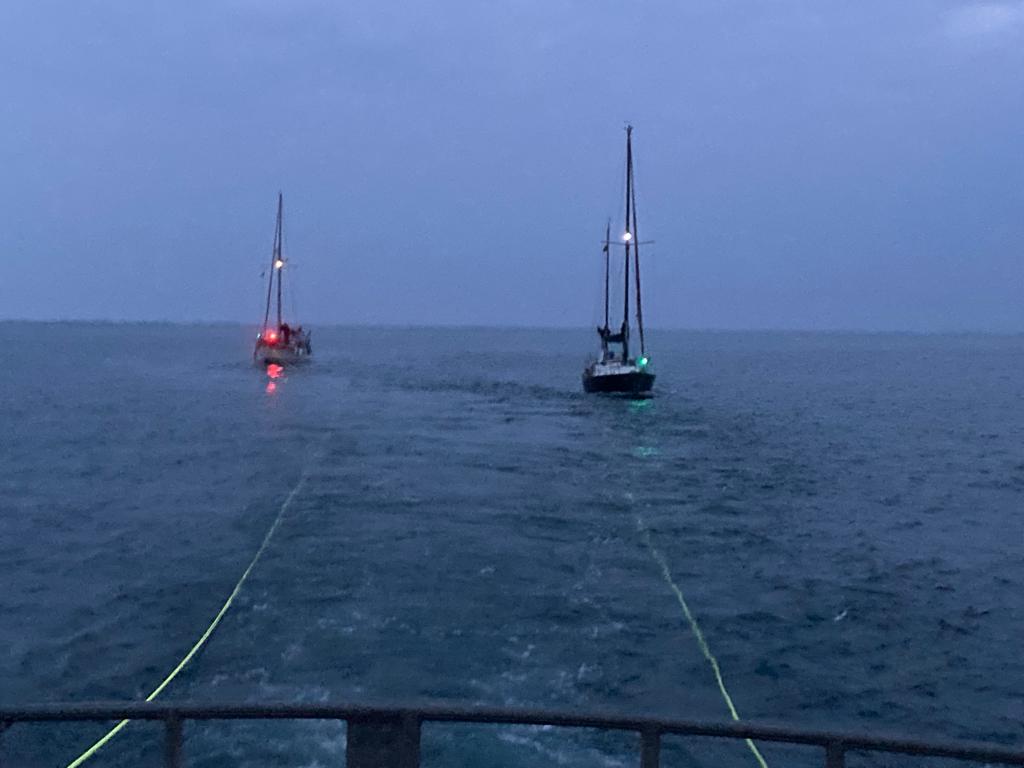 Two vessels in tow by RNLI lifeboat 