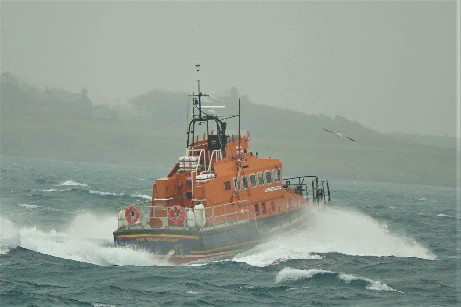 All-weather lifeboat sailing through rough seas 