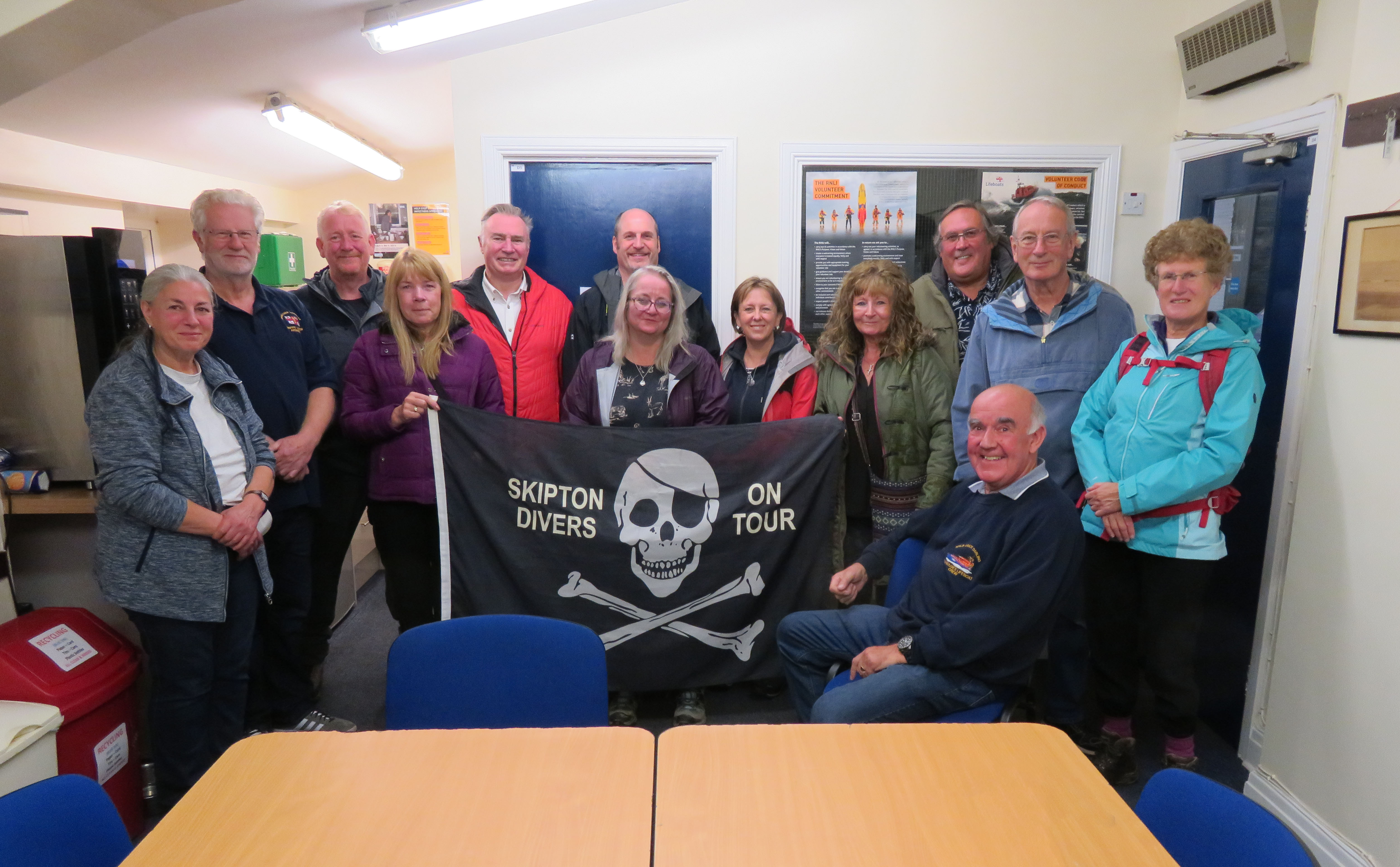 Members of Skipton Divers, Acting Lifeboat Operations Manager Colin Banks (2nd from left) and Chair/Press Officer Ian Clayton (seated)