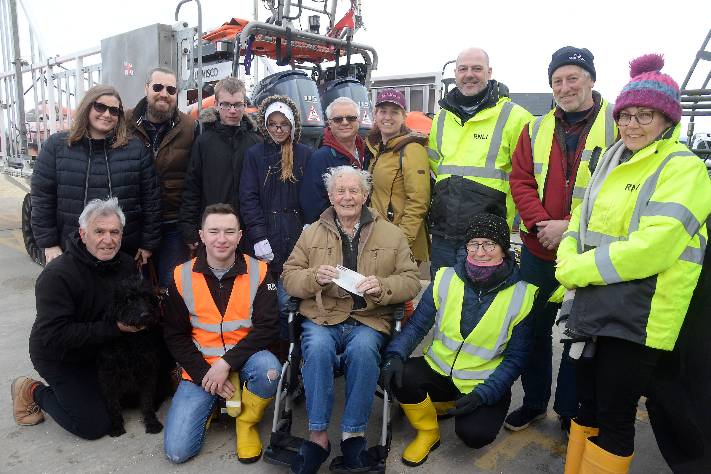 Philip Smith, 92, accompanied by his family presents the cheque for £928 on behalf of the Wednesday Trio's Bowling League to crew and volunteers at Whitstable RNLI on Sunday.