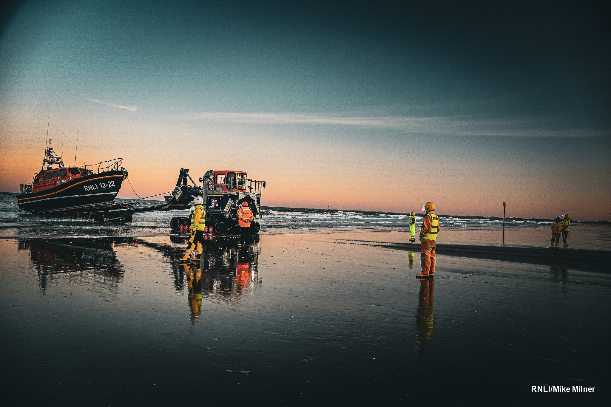 Recovery of lifeboat and crew almost complete. 