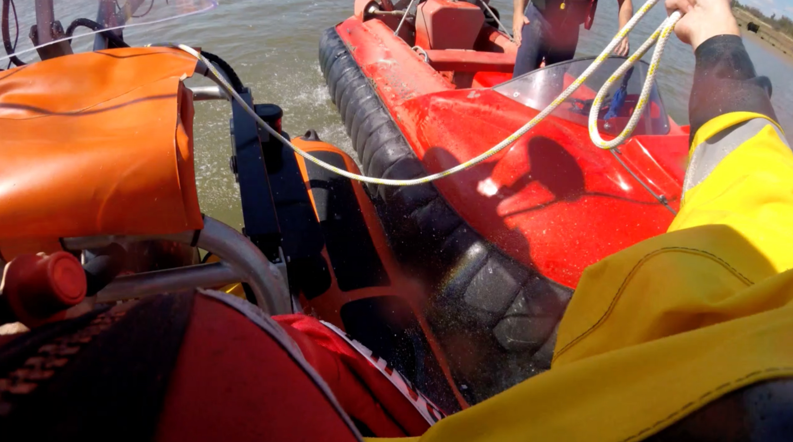 Gravesend RNLI setting up tow onto red hovercraft