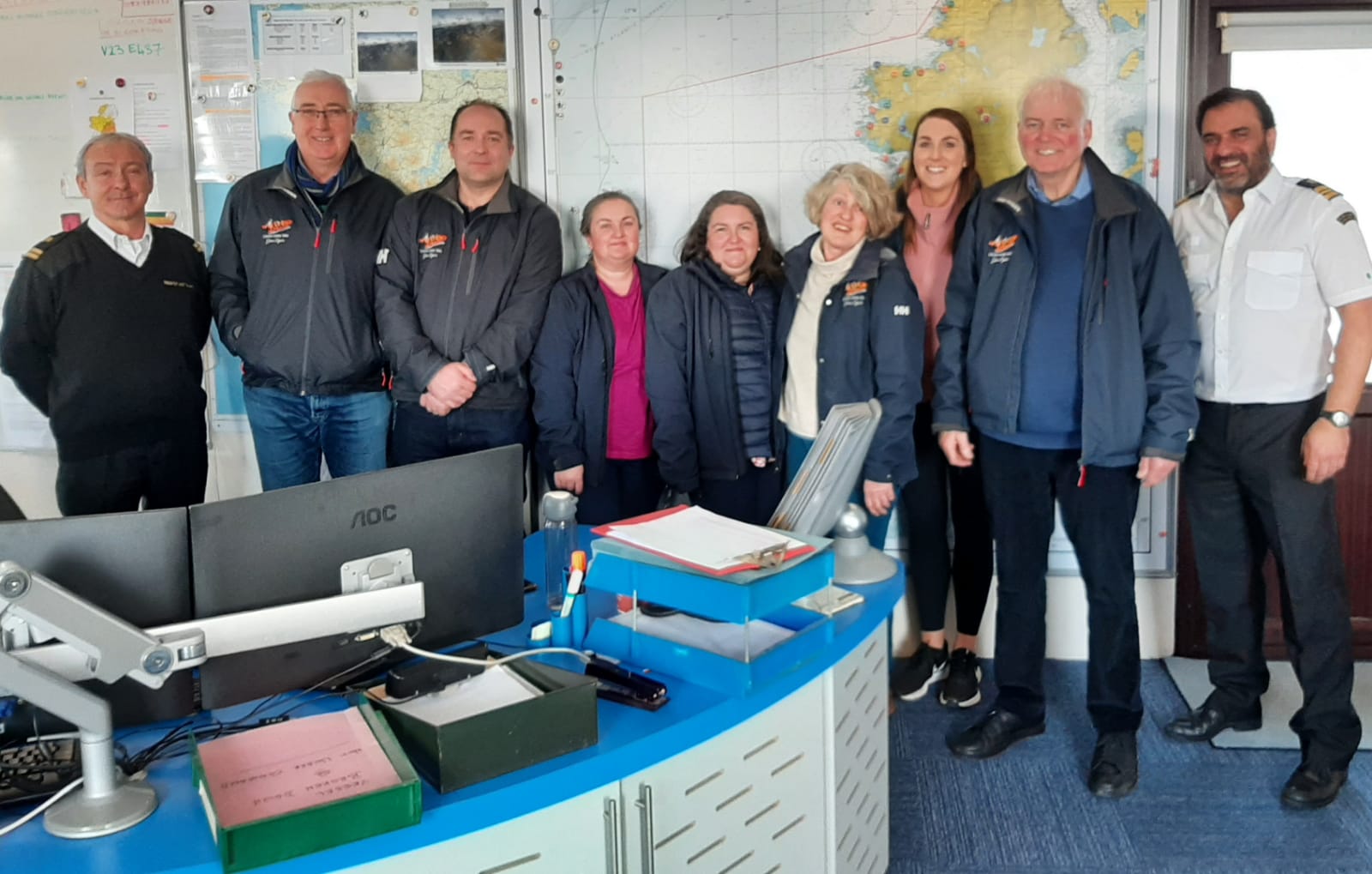 Volunteers from Lough Derg RNLI pose for a photograph with two of the watch officers at Valentia Coast Guard