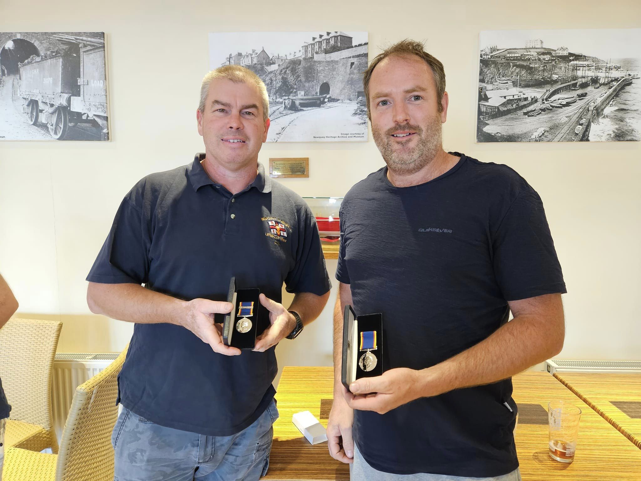 Mark Sutherland and Andrew Trebilcock with long service awards