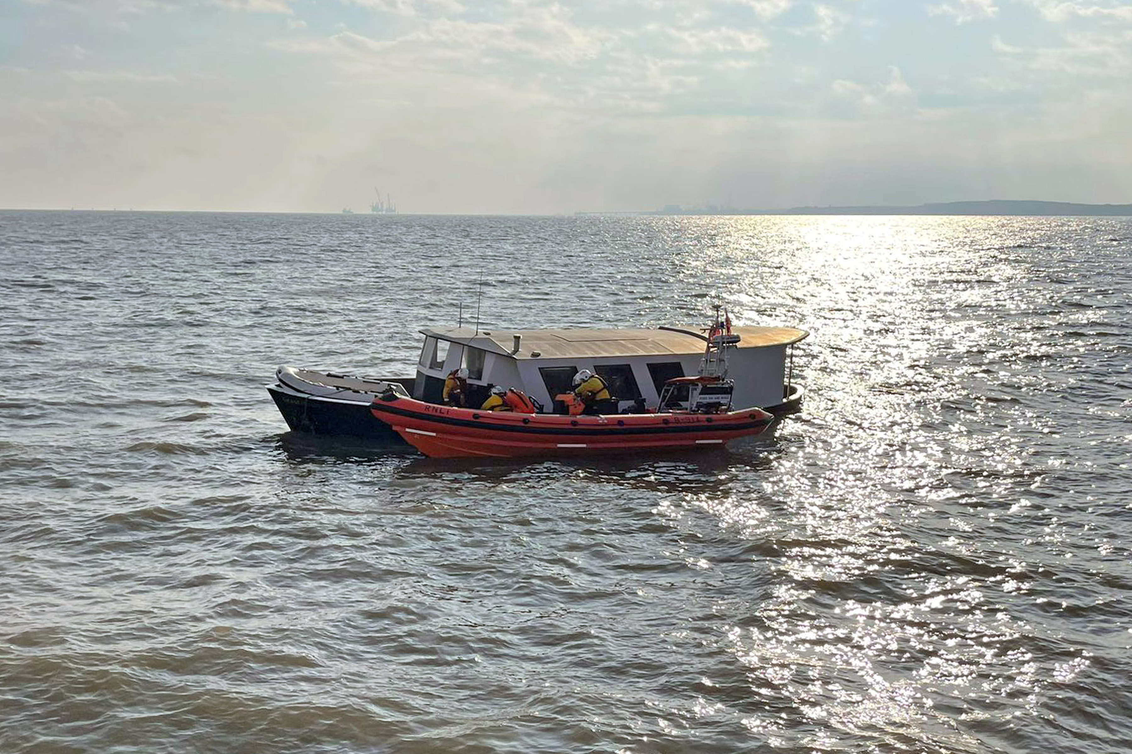 The casualty vessel with the Burnham-on-Sea Atlantic 85 'Doris Day and Brian' alongside
