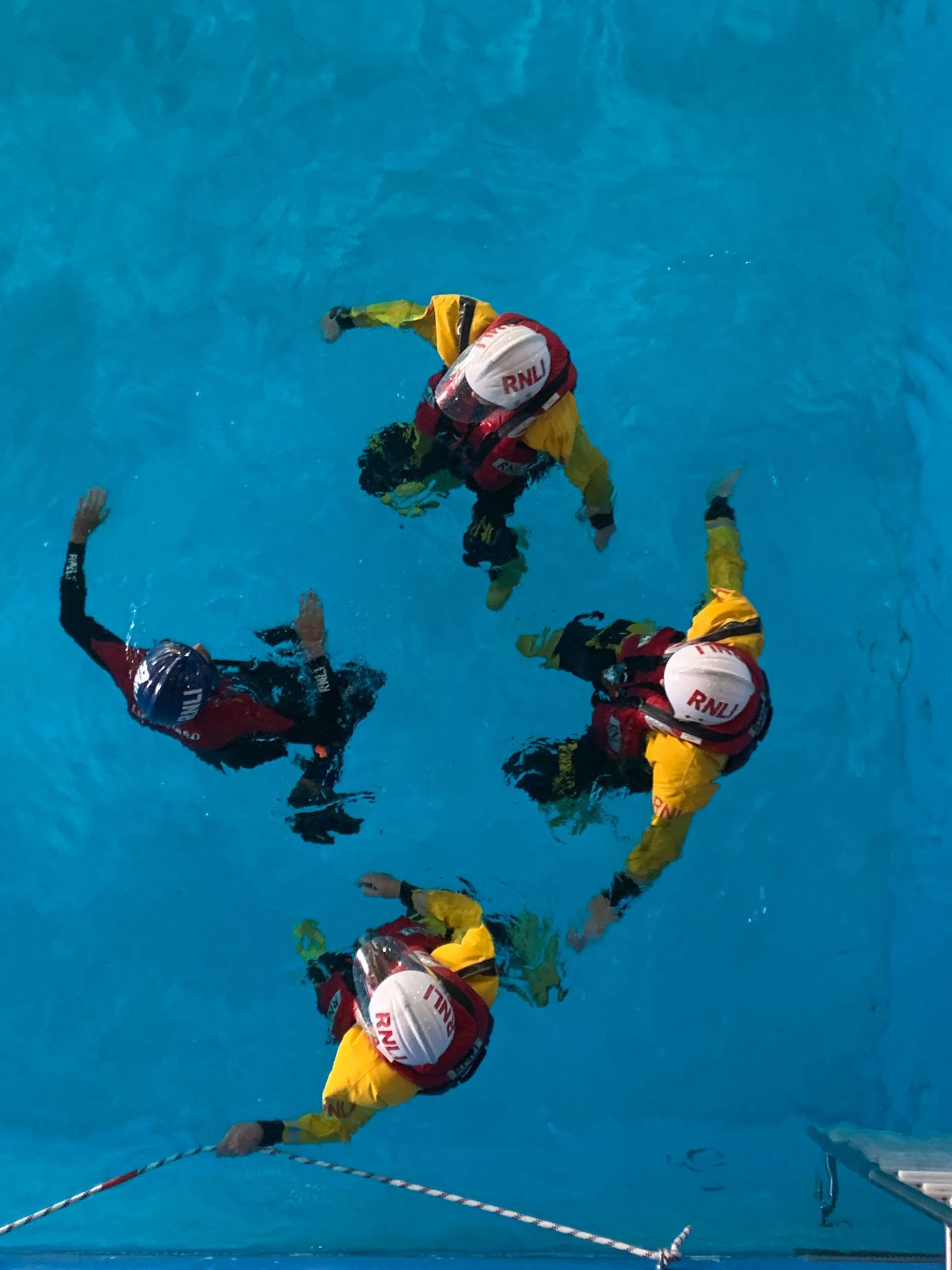 Crew members in the wave tank at the Sea Survival Centre