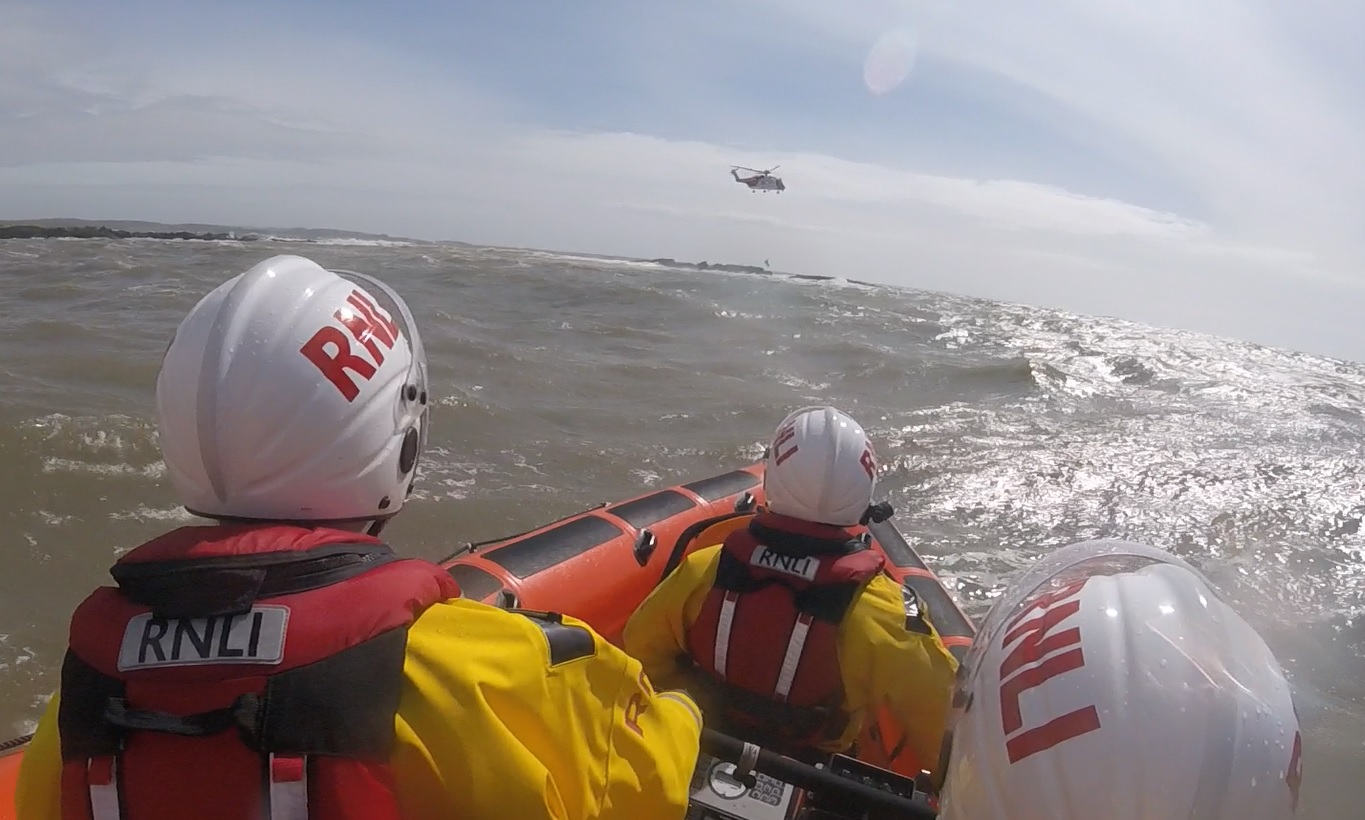 Kirkcudbright lifeboat stands by as bodyboarder is lifted from rocks by rescue helicopter