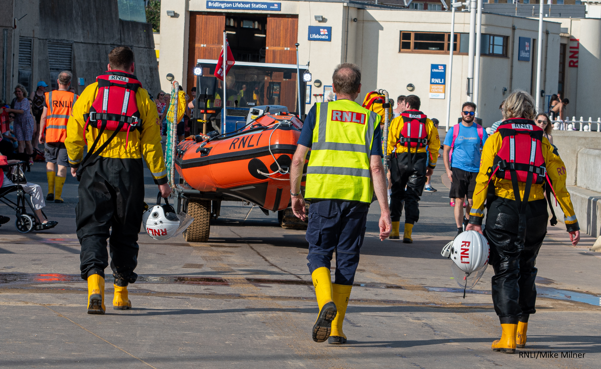 Volunteer crew of Bridlington RNLI returning after paddleboard launch.