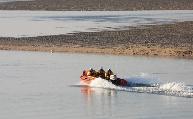 Call out 22 August Wells RNLI Inshore lifeboat Peter Wilcox aids tow people cut off by the tide