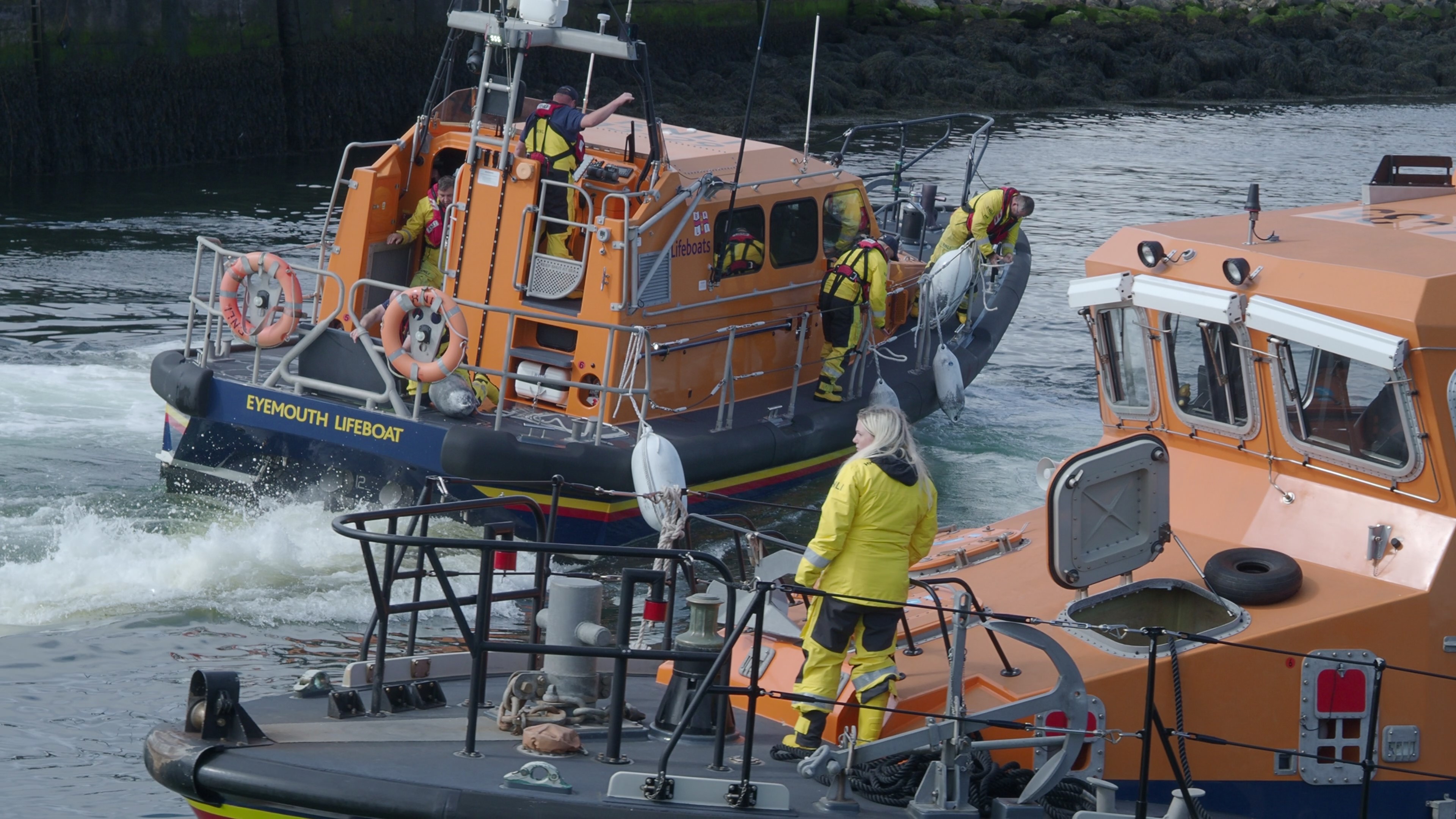 Volunteer crews on Eyemouth lifeboat head to a shout on Gala Day
