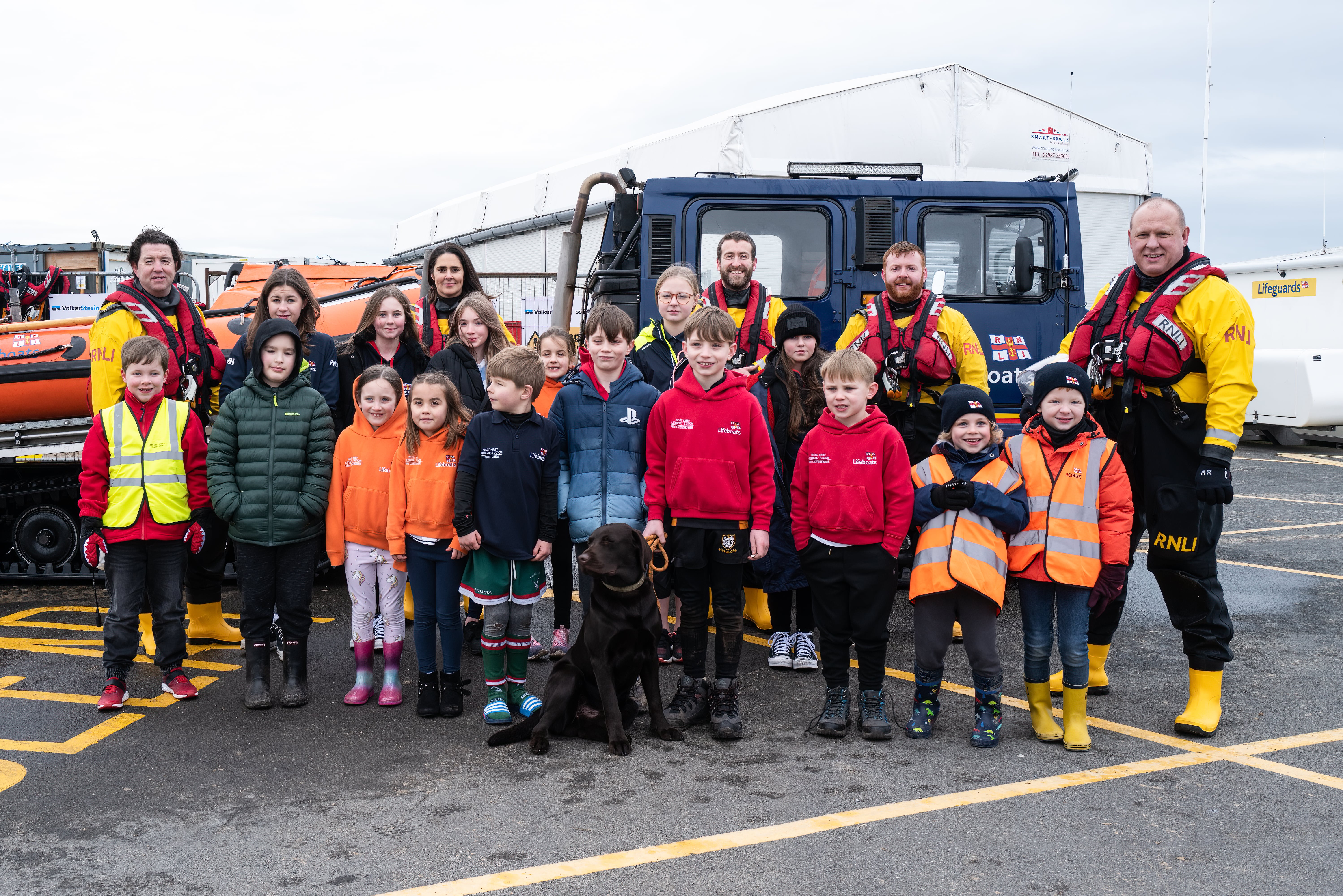 West Kirby crew stood with local children