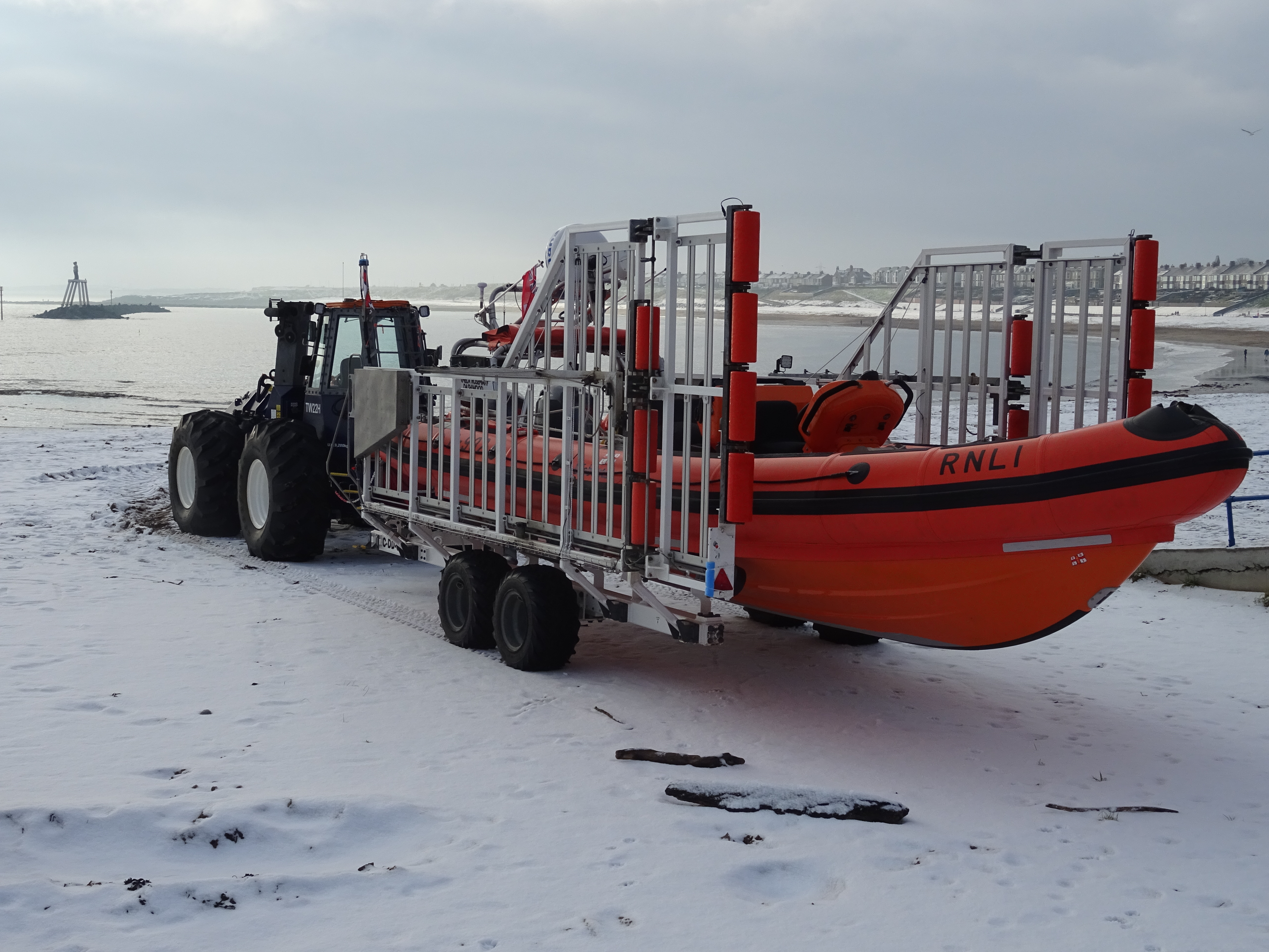 The rescue kit on display on the snow covered beach