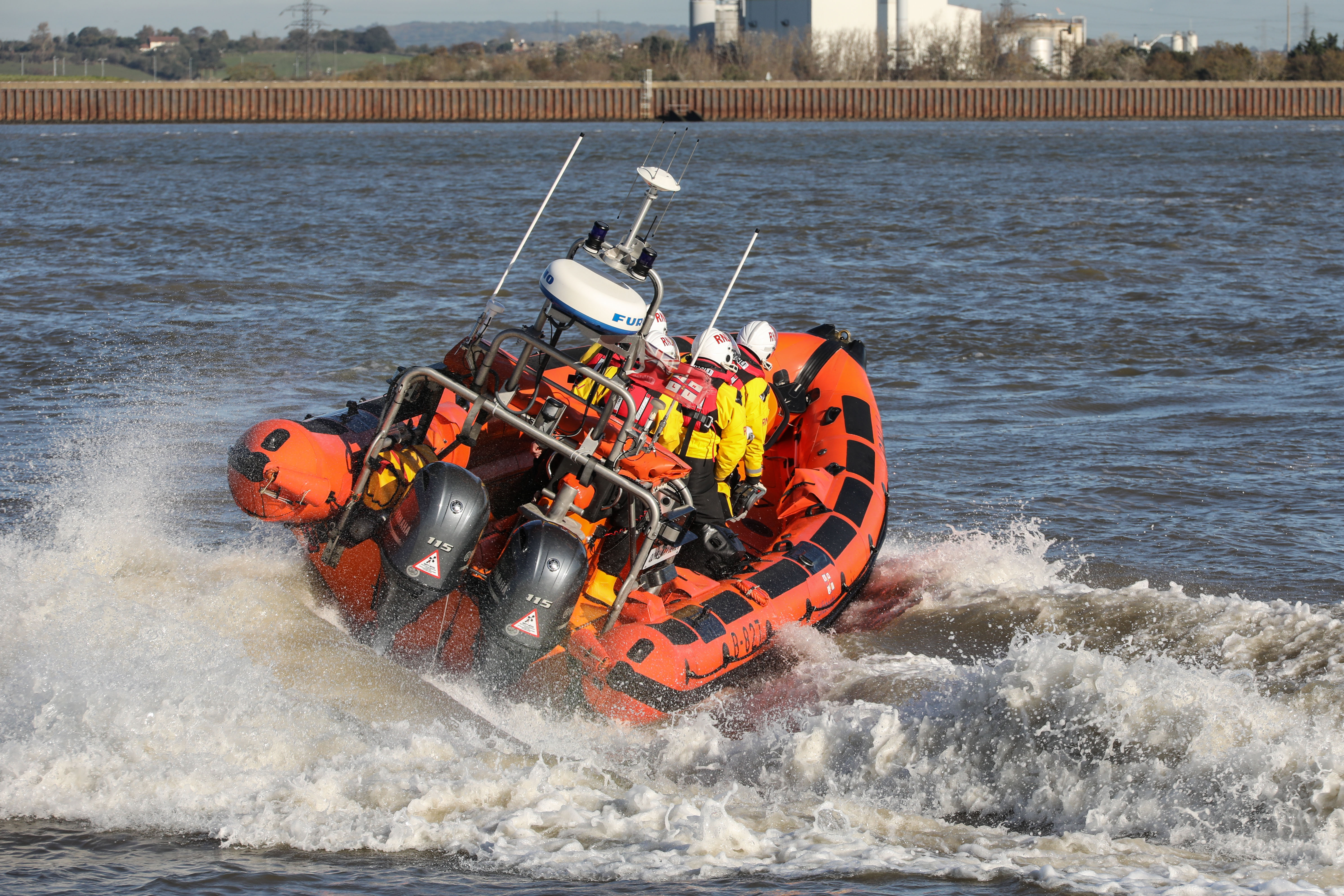 Stock photo of the Gravesend Atlantic 85 lifeboat 'Olive Laura Deare II' under speed on the water.