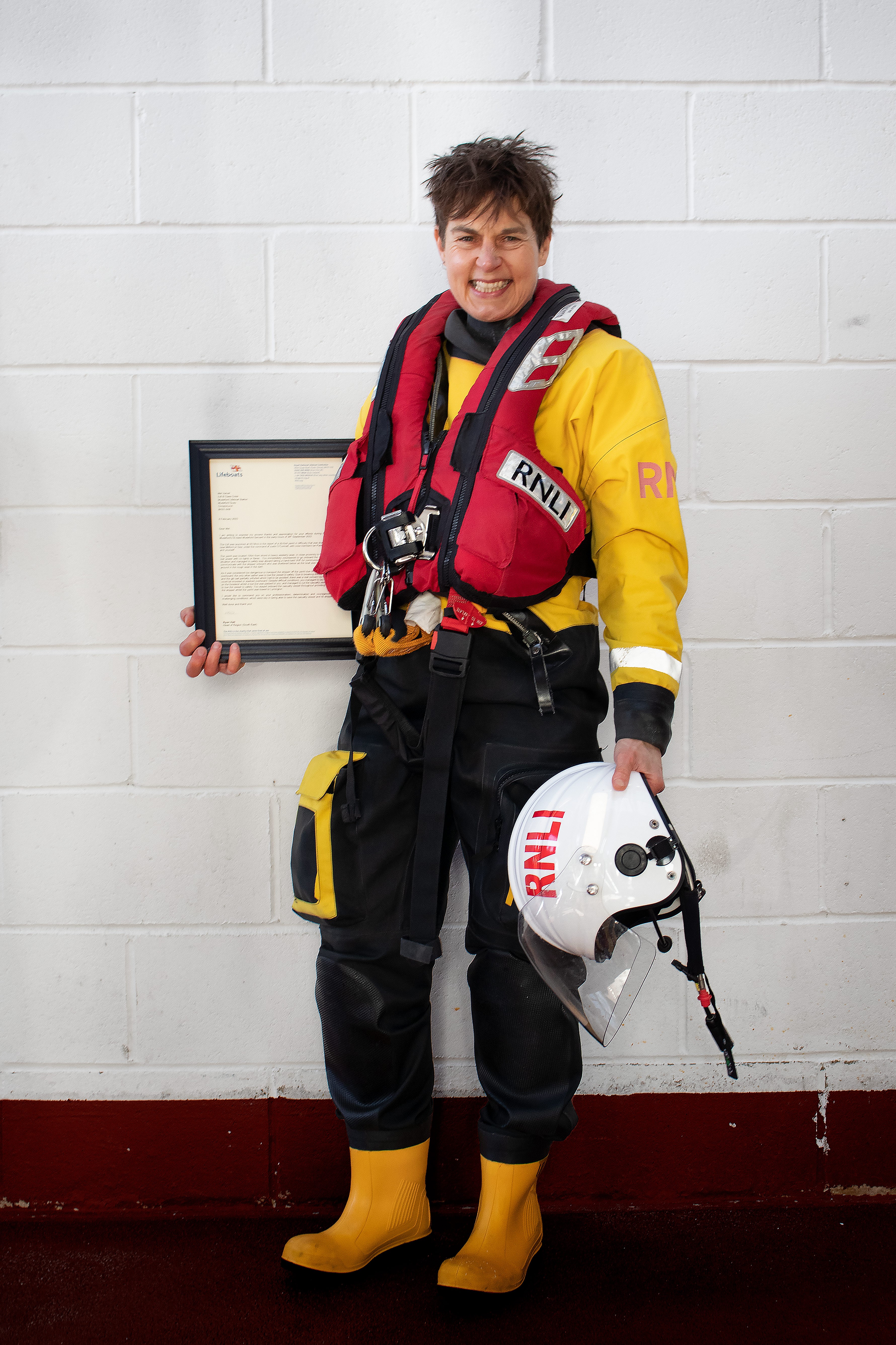 Mudeford crew member Mel Varvel with her Letter of Commendation.
