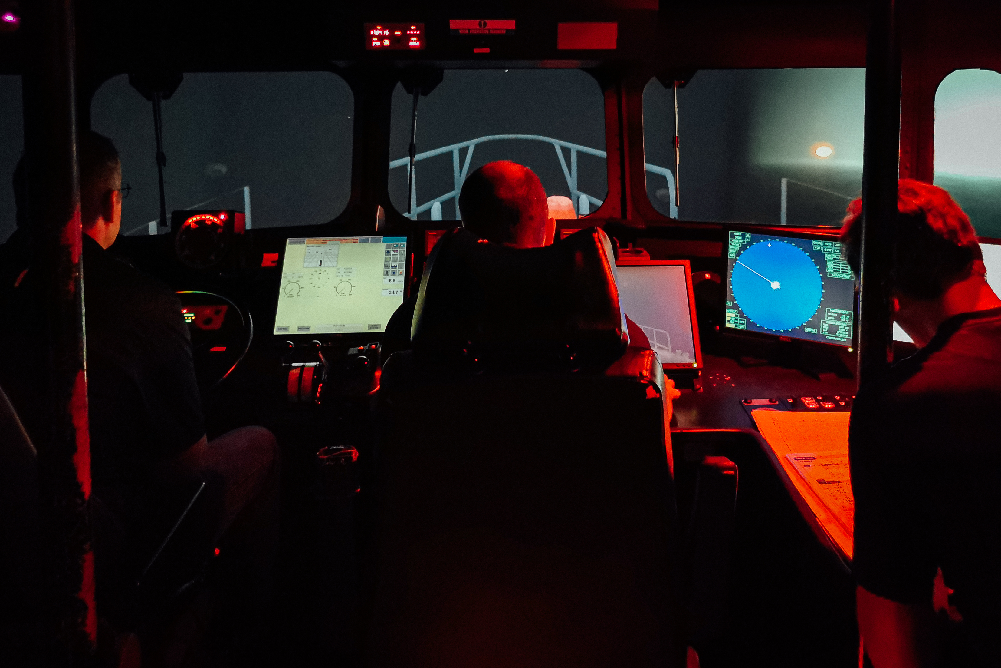 Student conducting SAR navigation exercises onboard the RNLI LIfeboat simulator.