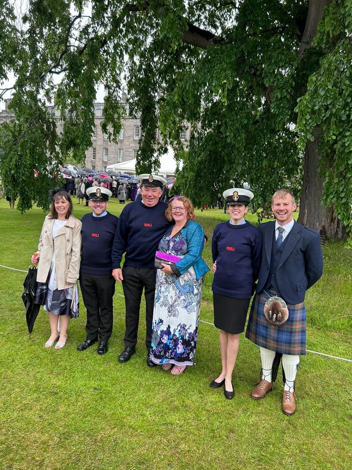 The three helms and their partners in the gardens of Holyrood