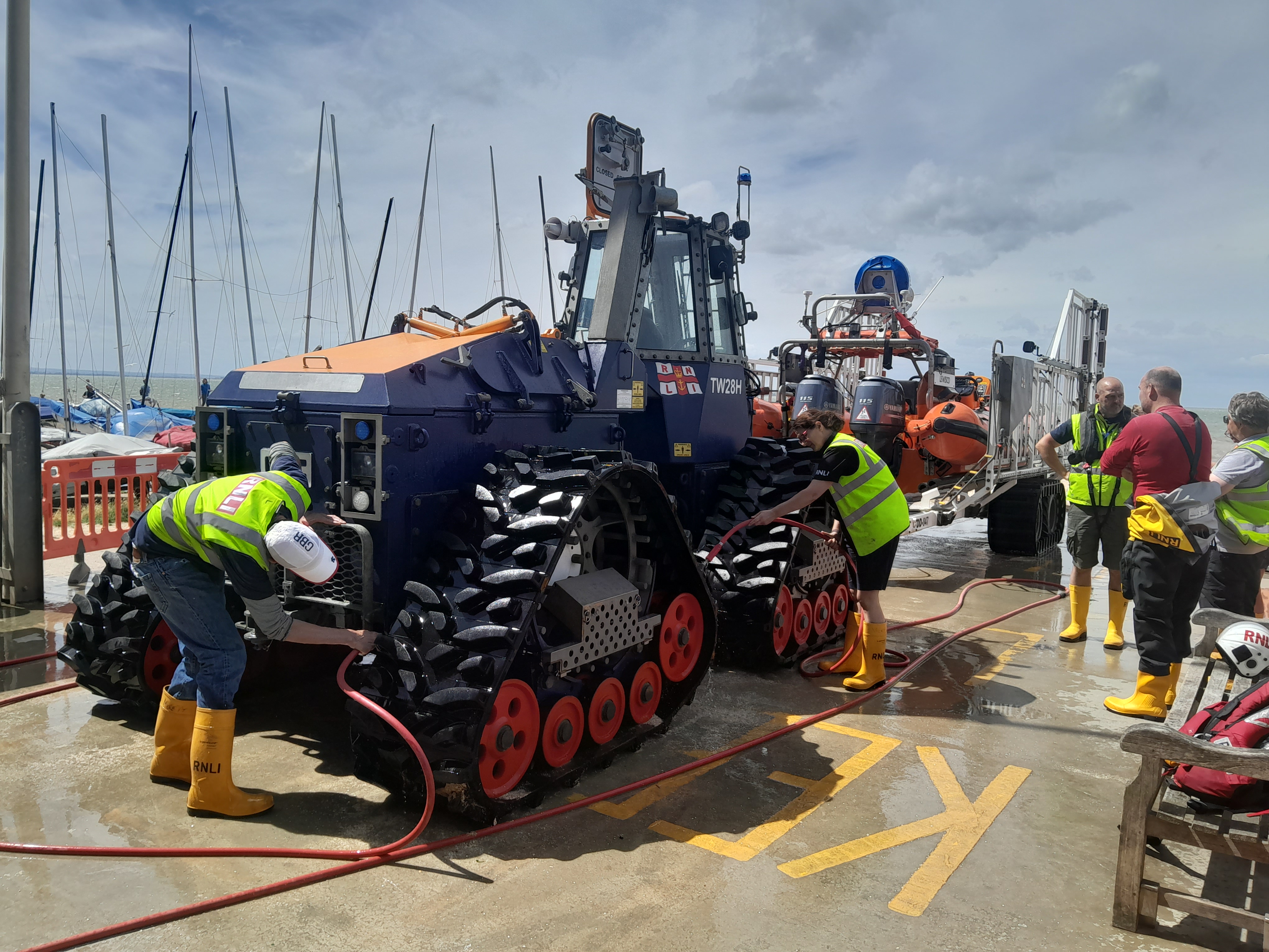 The launching tractor and lifeboat carriage are washed down after Sunday's calls.