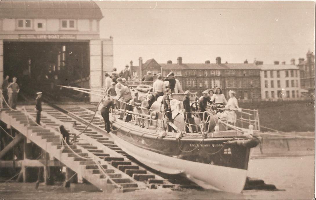 Image of lifeboat being recovered up the slipway 