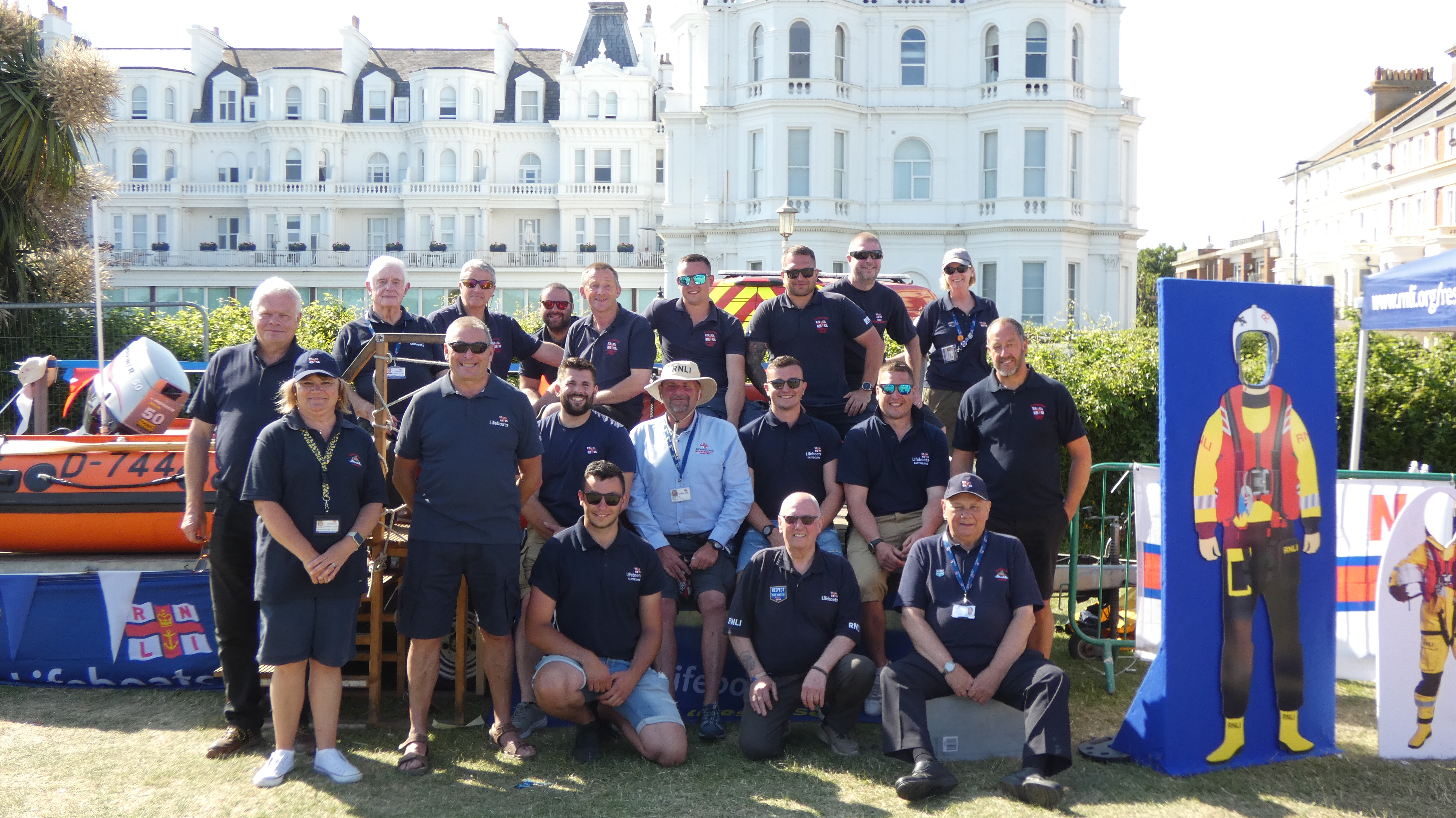 Crew in front of their display 