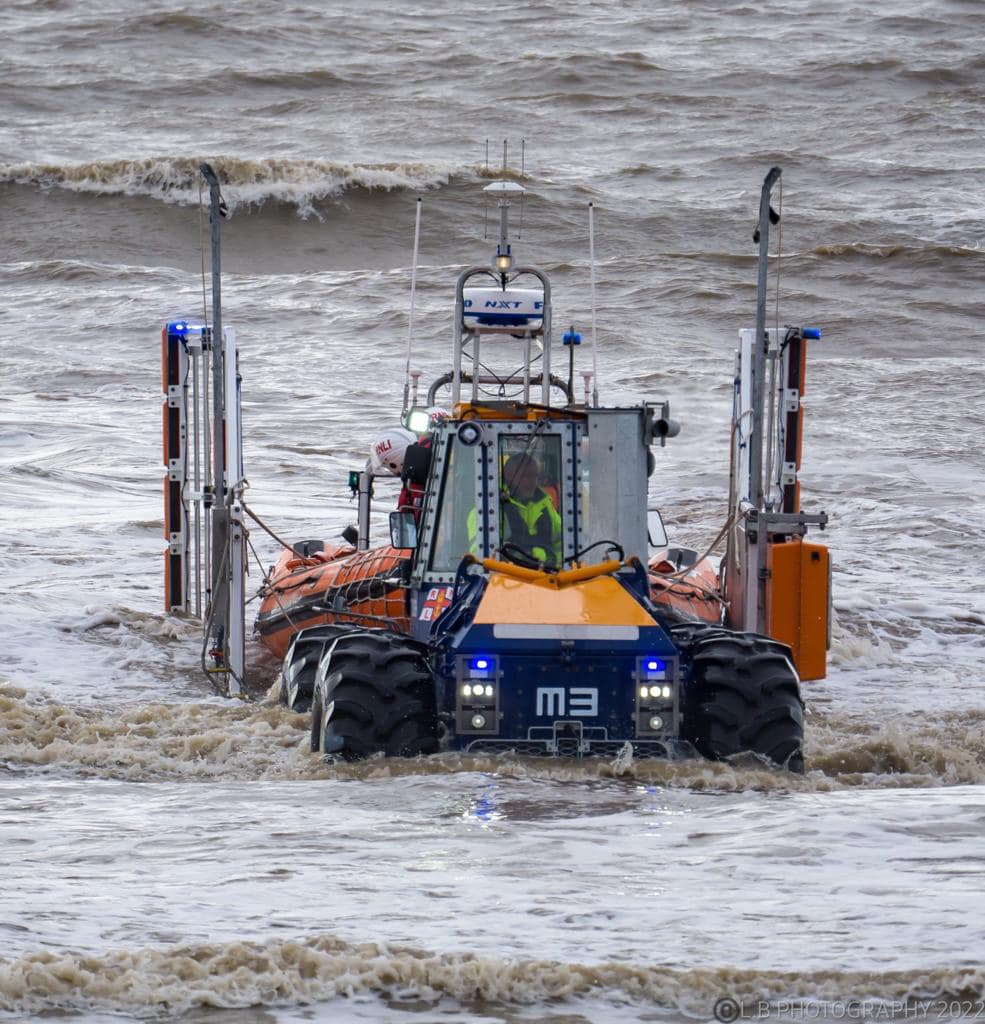 Tractor and trailer in the water 