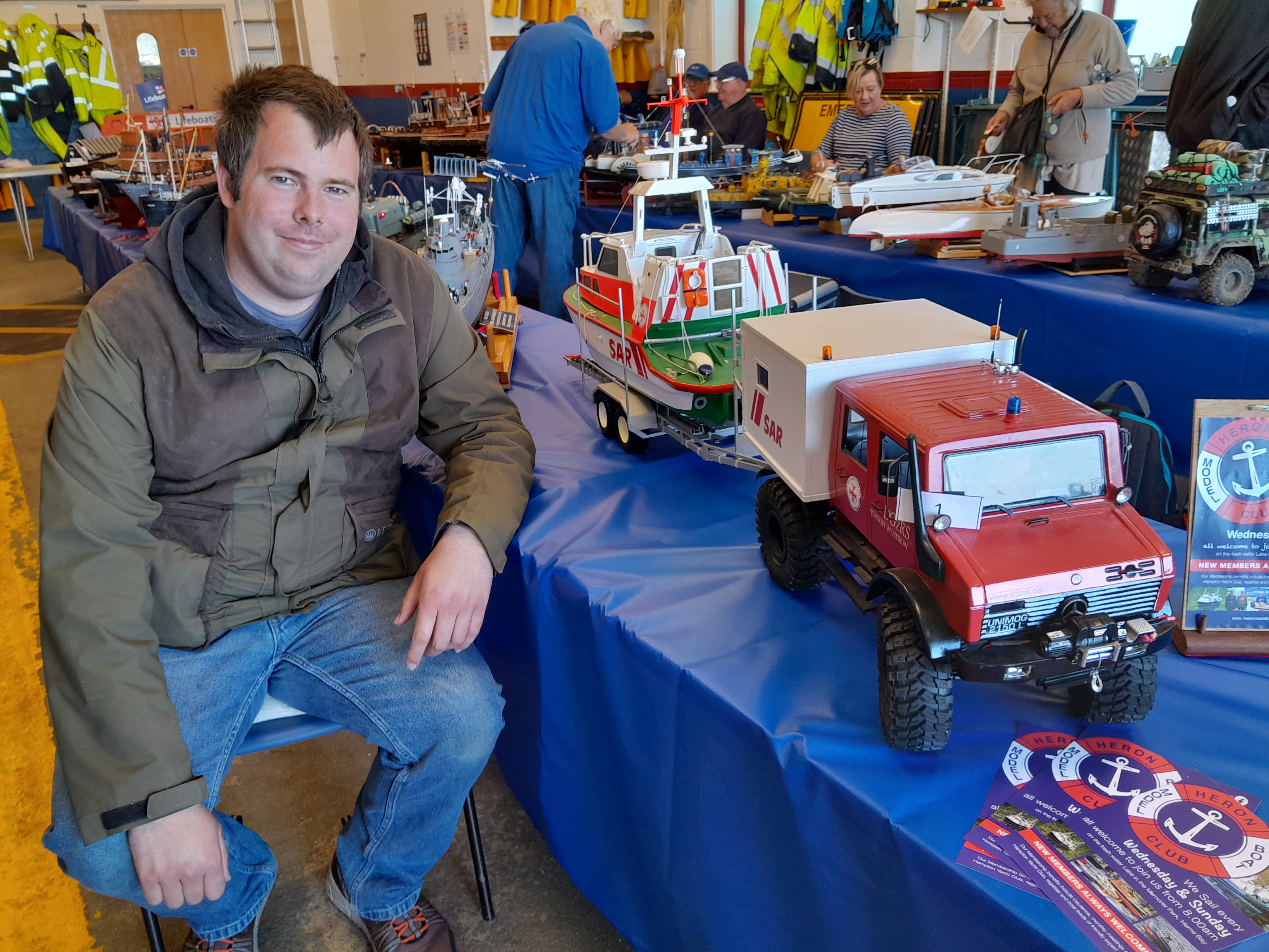 Adam Maplesden with his German search and rescue craft on a trailer towed by a Unimog vehicle at Heron Model Boat Club show at Whitstable RNLI on Sunday.