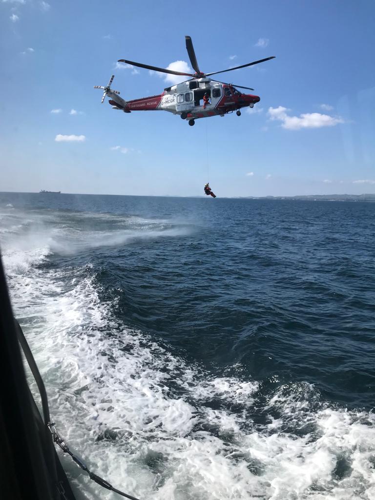 Troon RNLI lifeboat on exercise in between callouts with the coastguard helicopter