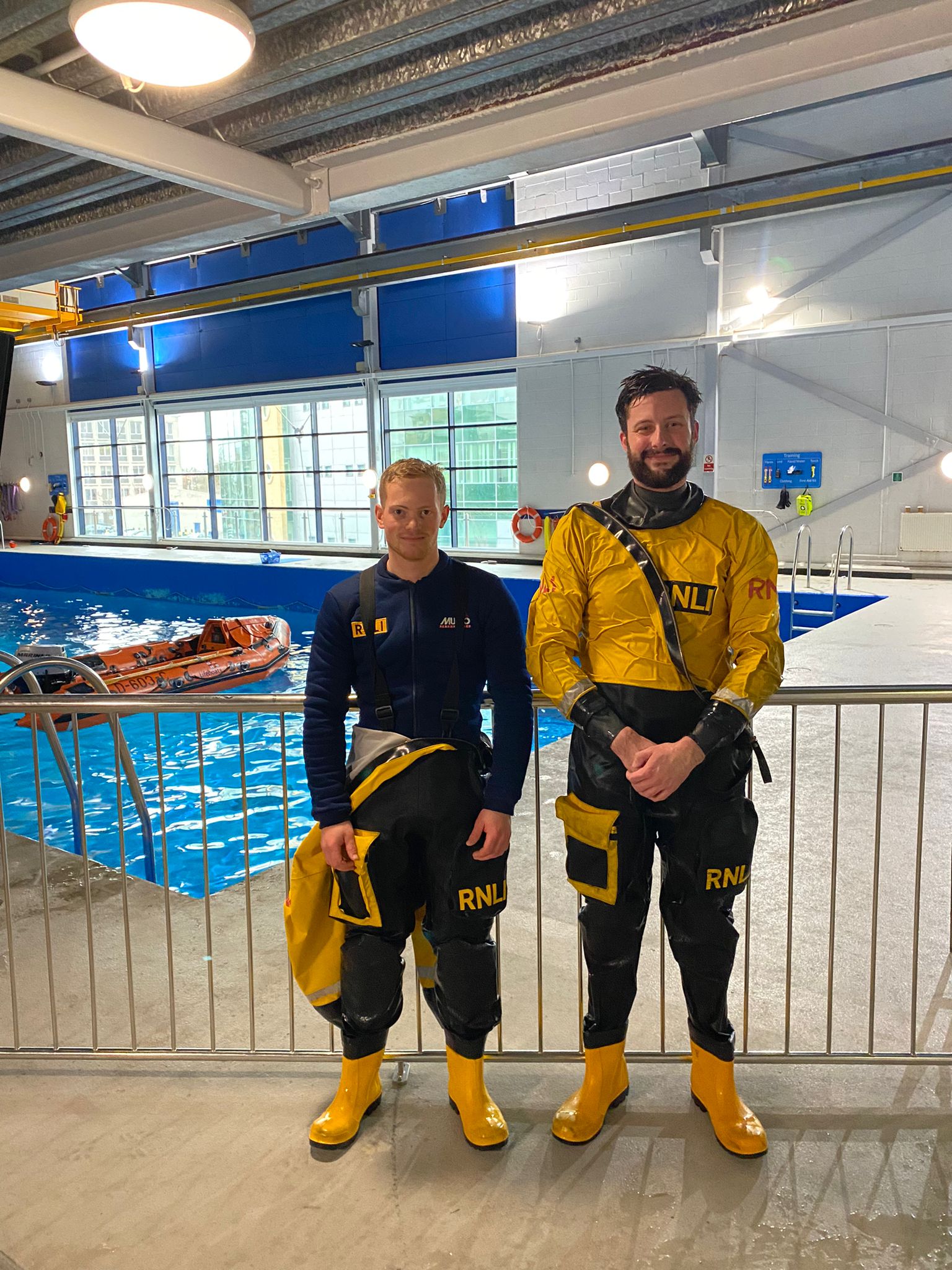 Volunteer crew members Charlie and Jake at the RNLI College in Poole, Dorset during their crew emergency procedures course.