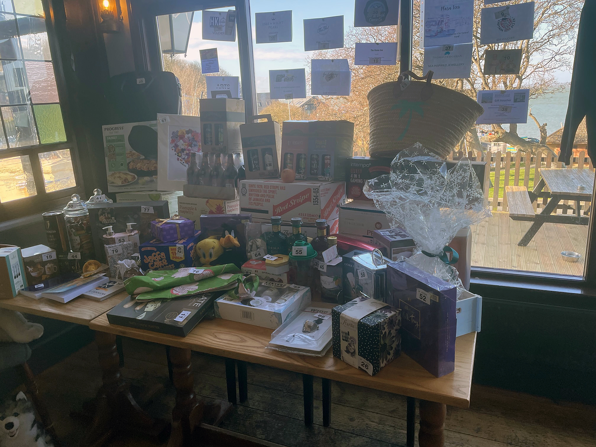 The table weighed down with raffle prizes.