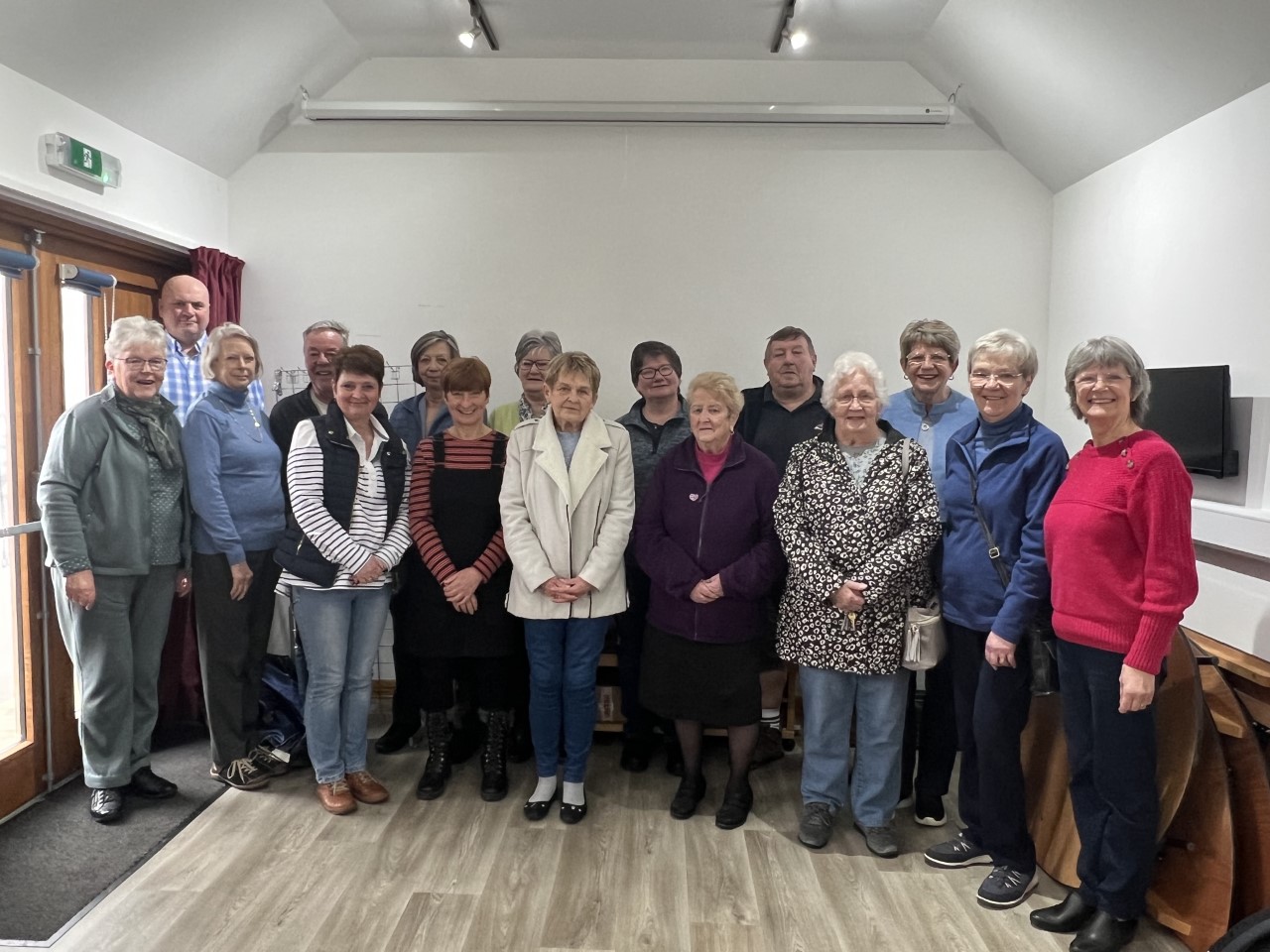 Portpatrick RNLI Gift Shop volunteers together with Ian Beck (Back row left) Chairman of Portpatrick RNLI