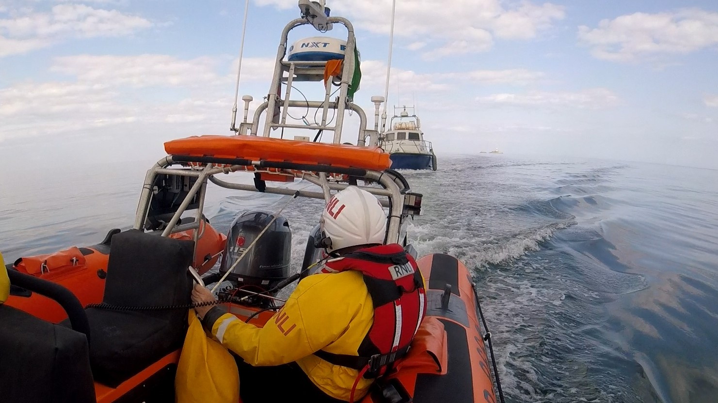 Skerries RNLI tow motorboat with two on board to safety