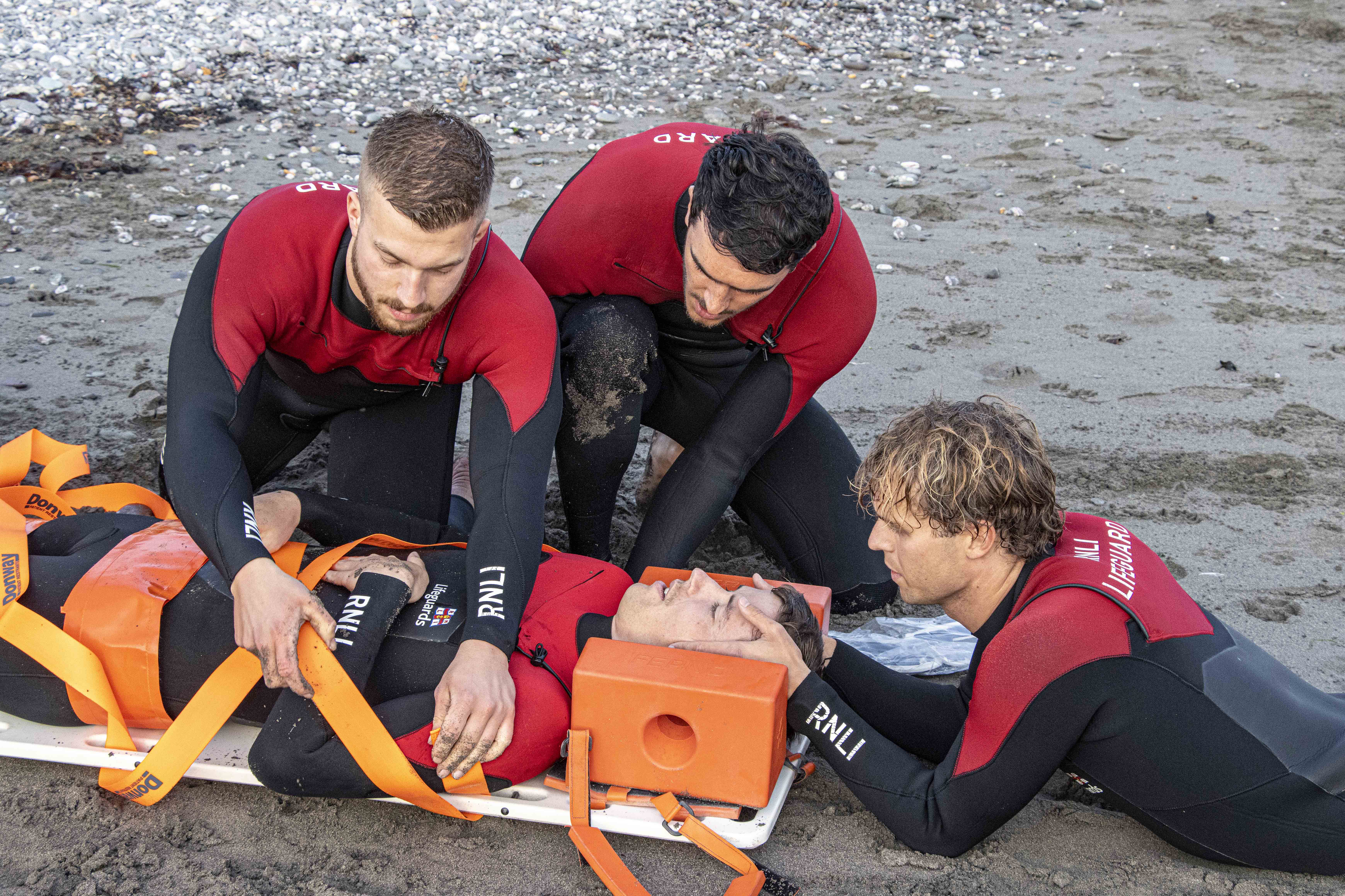 Looe RNLI volunteer crew training with RNLI SE Cornwall lifeguard team