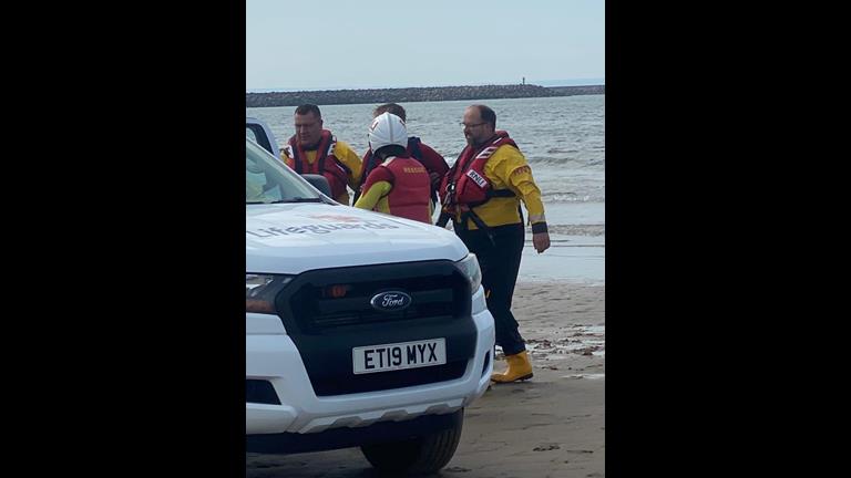 Lifeguards Carry Port Talbot RNLI and RNLI lifeguards carry out a joint exercise off ...