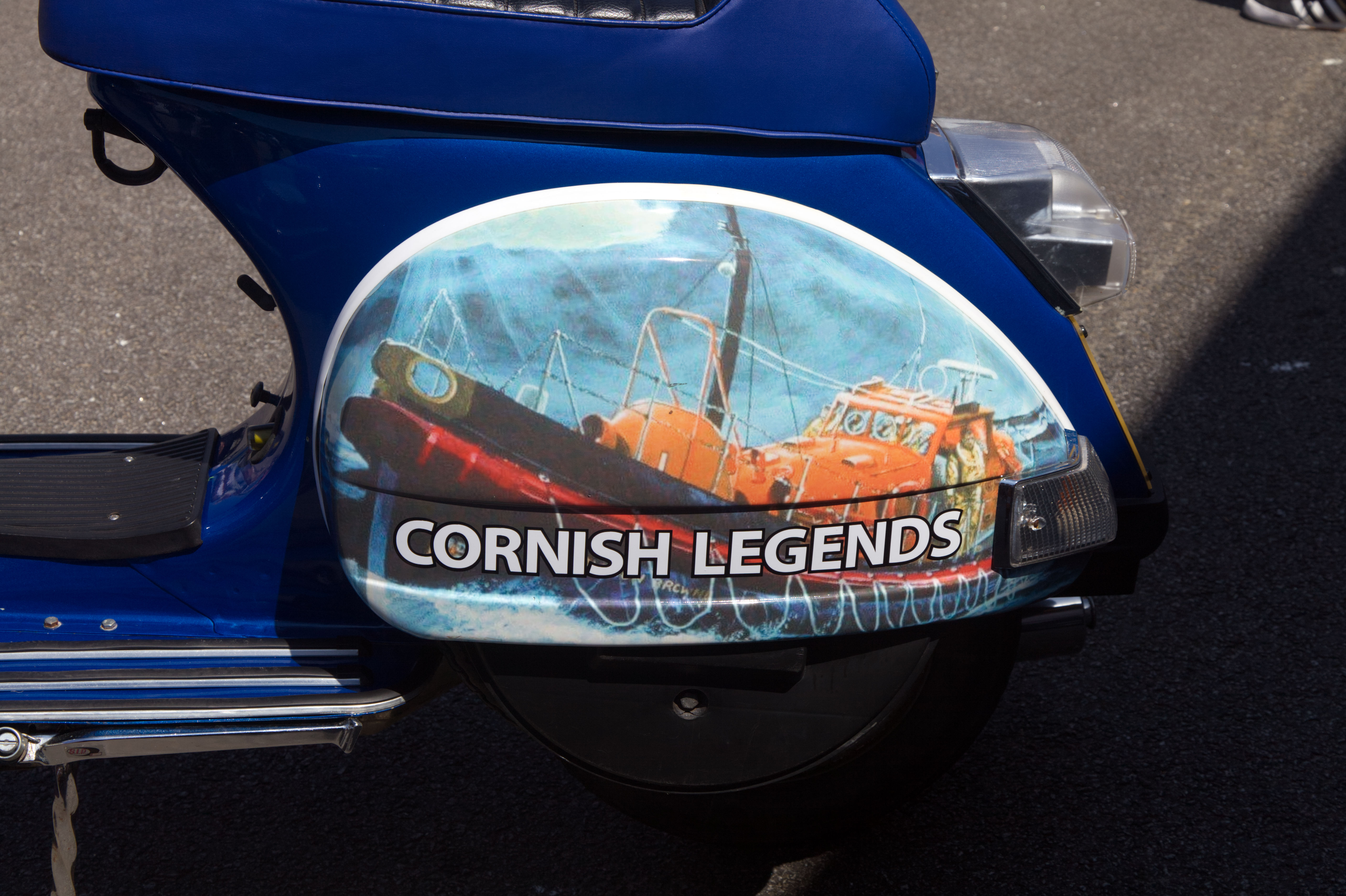 shows image of lifeboat on scooter