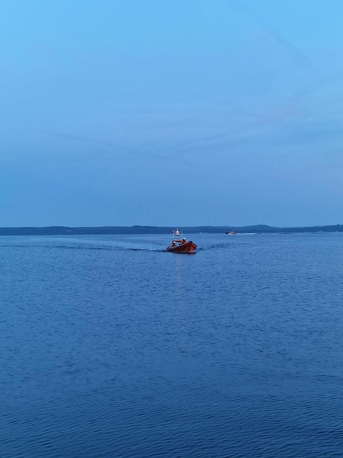 Largs lifeboat with casualty vessel
