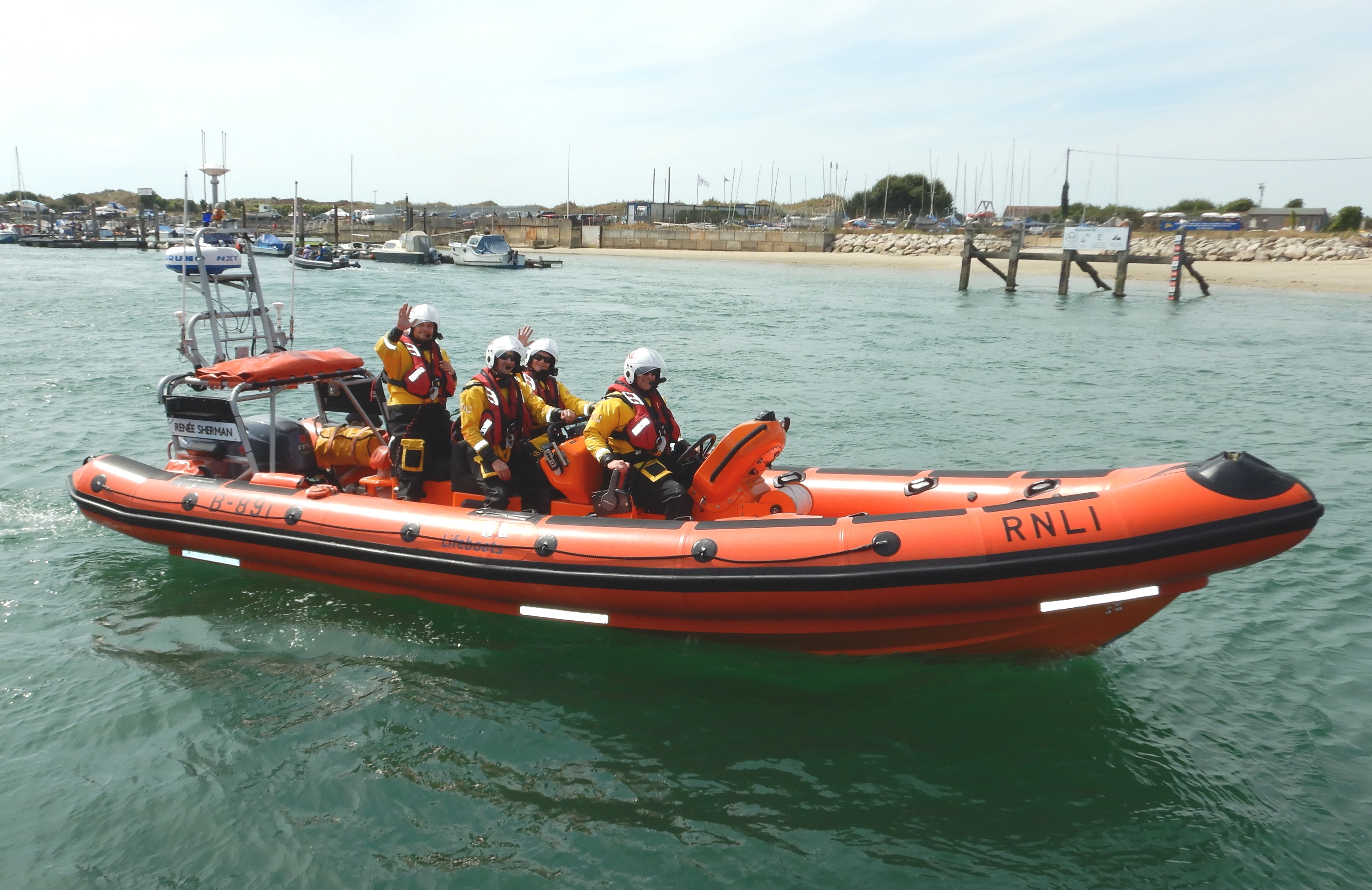 A picture of the B Class lifeboat Renee Sherman in the river with her crew