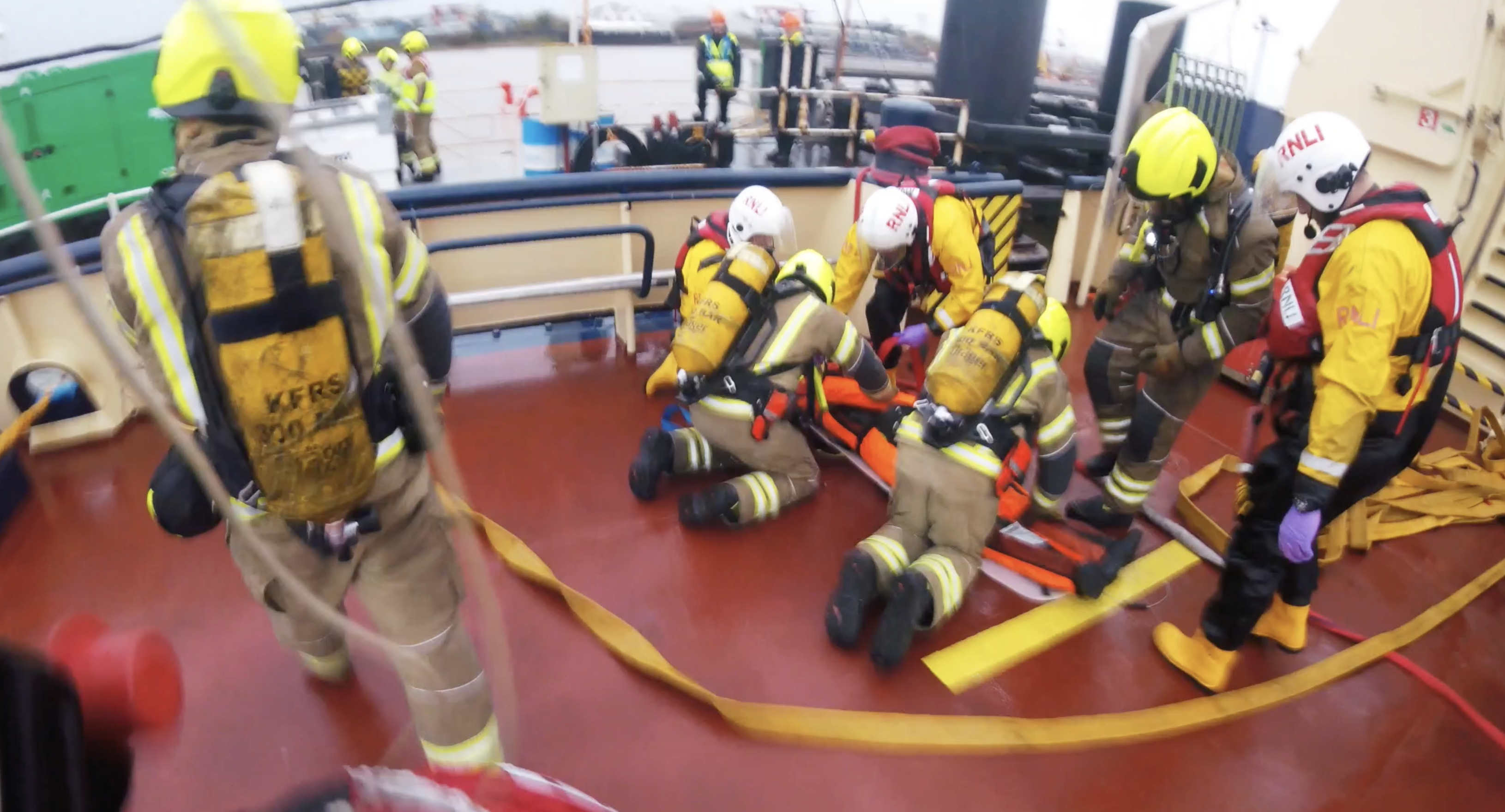 RNLI along with Kent Fire And Rescue extract casualty from engine room of tug