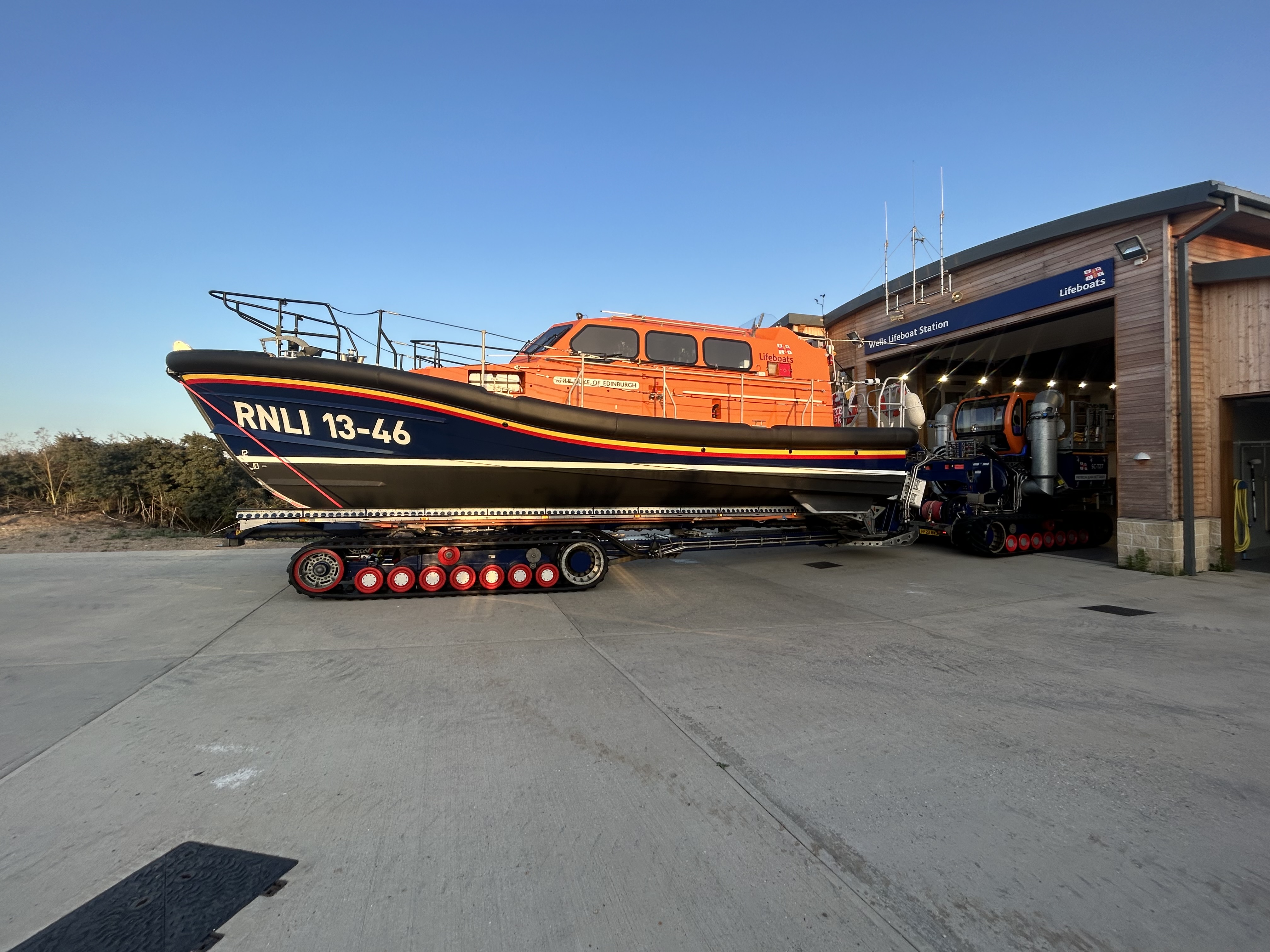 Photo of the Wells RNLI Shannon class lifeboat and the front of the boathouse