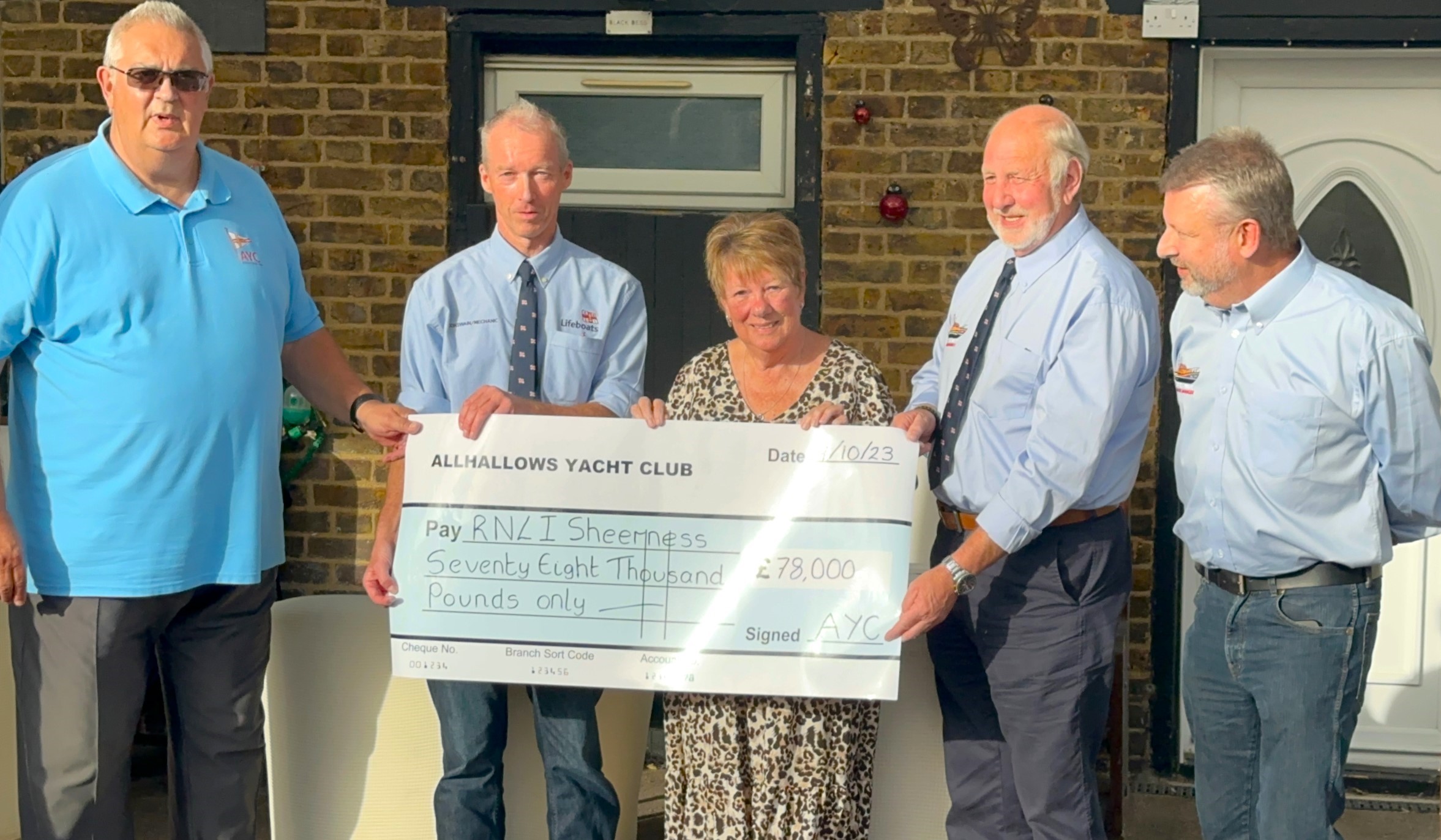 Andrew Vincent and Mrs Cheryl Frame with Coxswain Paul Jarvis, Robin Castle and Nigel Budden
