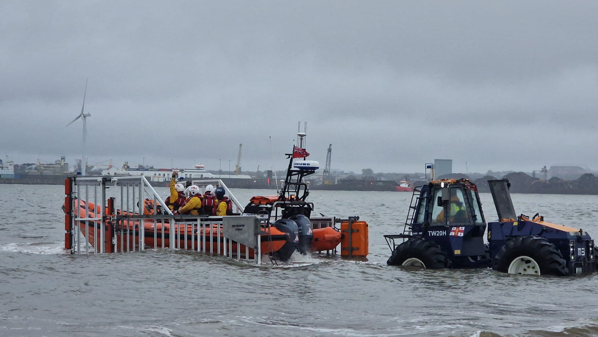 Lifeboat and tractor in the river Mersey