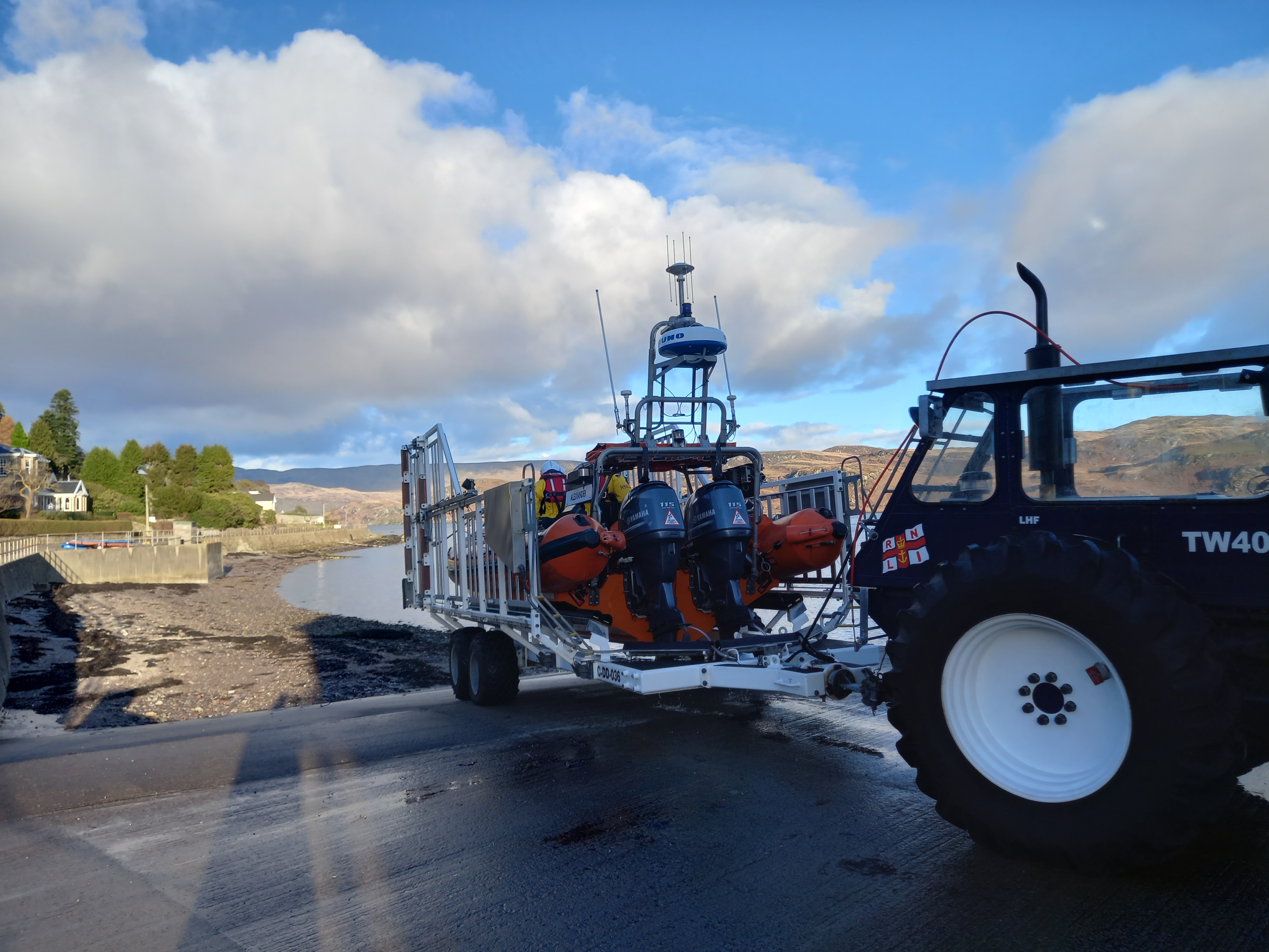 The RNLI Tighnabruaich inshore lifeboat and tractor on the slipway