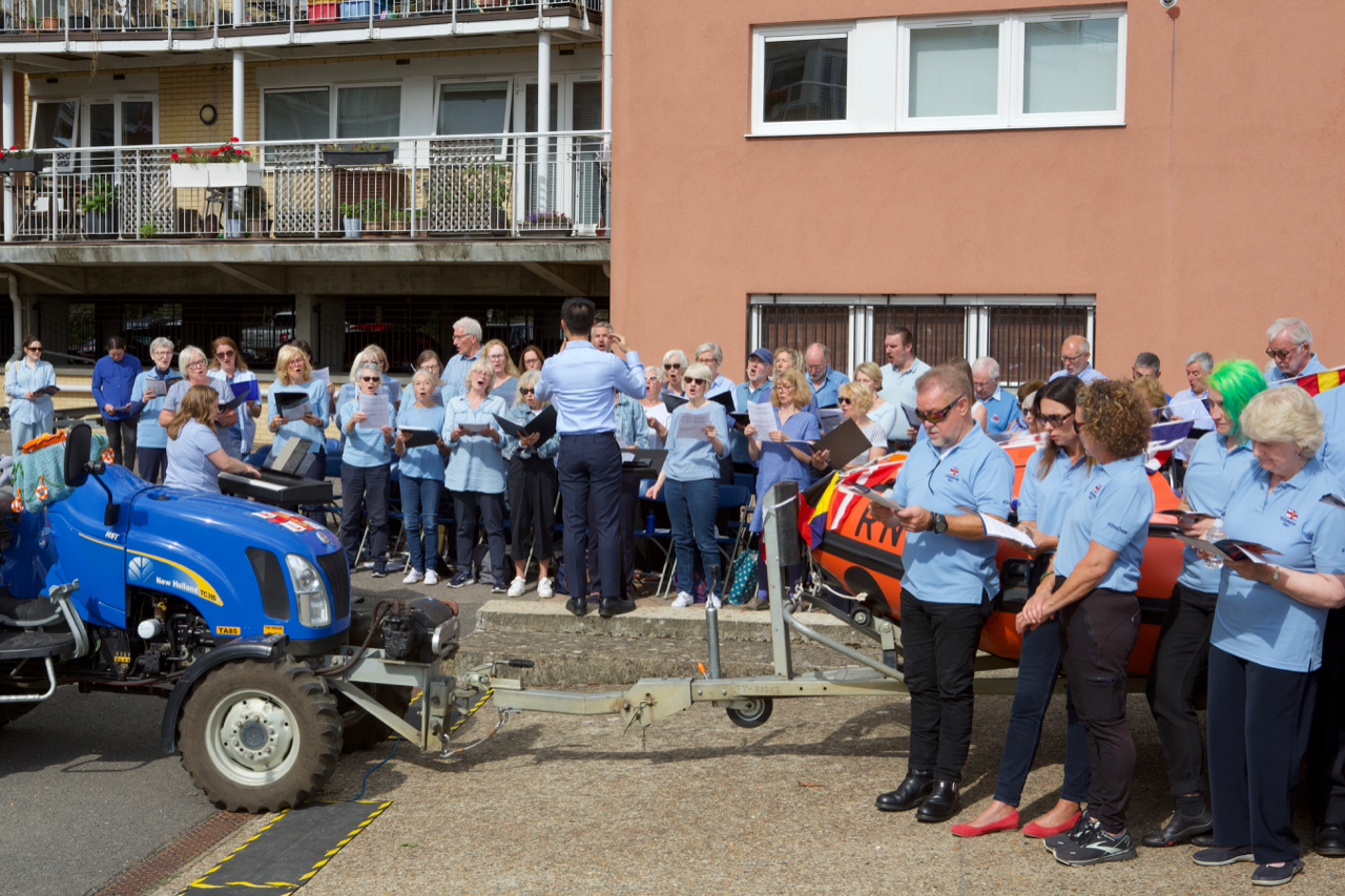 Local Choir groups lead the singing