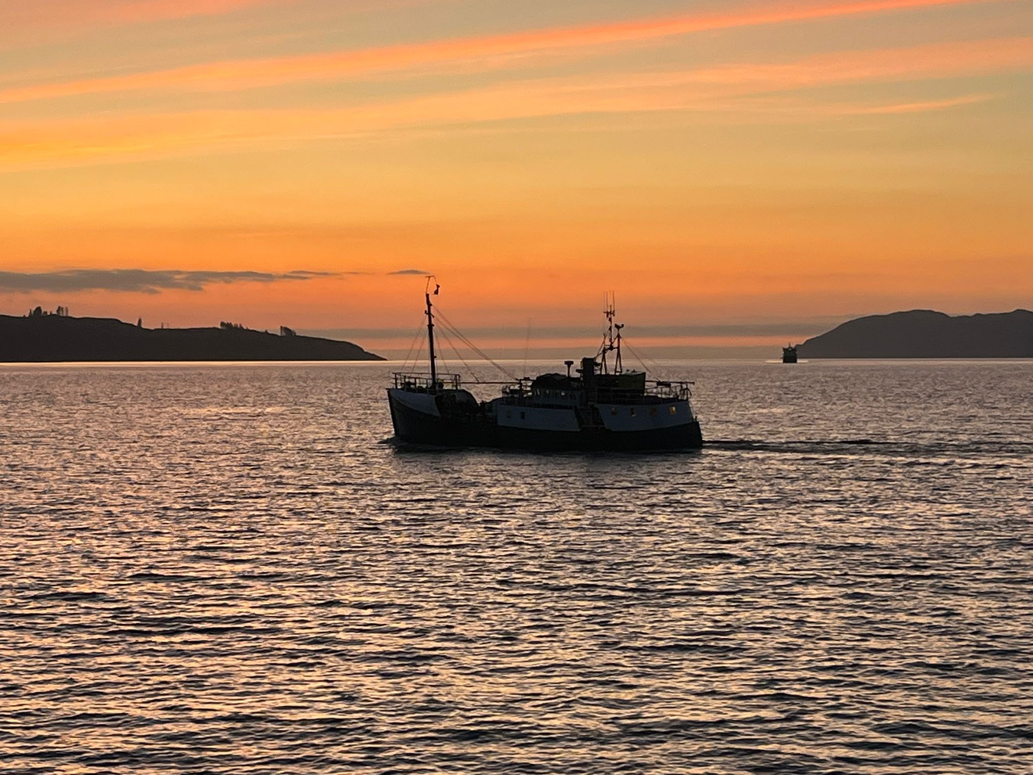 Dive vessel returning to Tobermory at sunset
