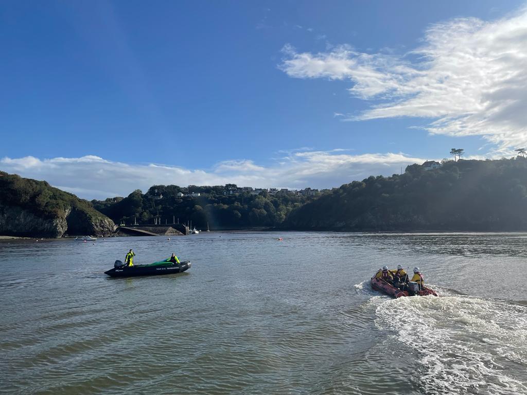 Volunteer crew of the charity’s D class inshore lifeboat Edward Arthur Richardson conveying the casualties into lower town and safety boat from Hanseatic Spirit having retrieved the kayaks.
