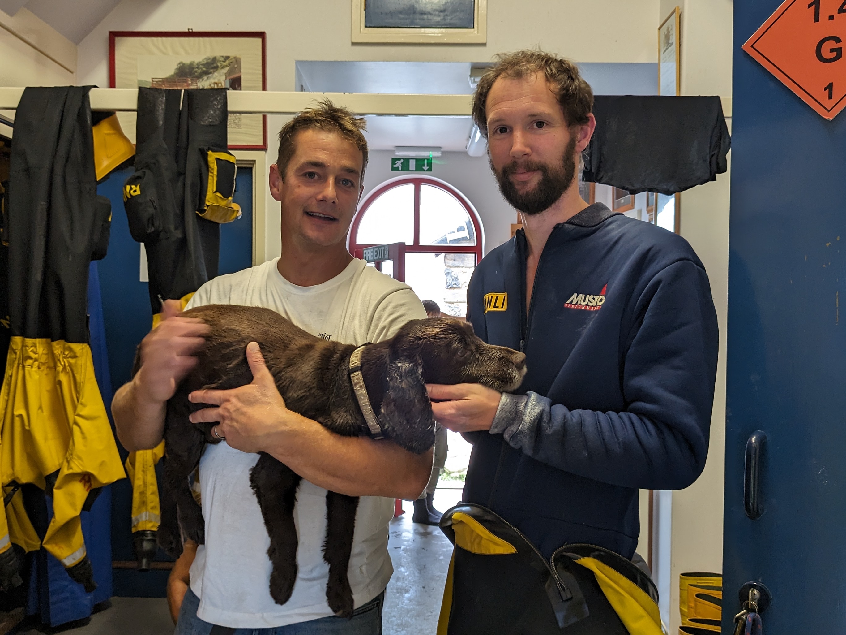 Crew member Phil van Kuffeler with Reuben and his owner Tom Palmer