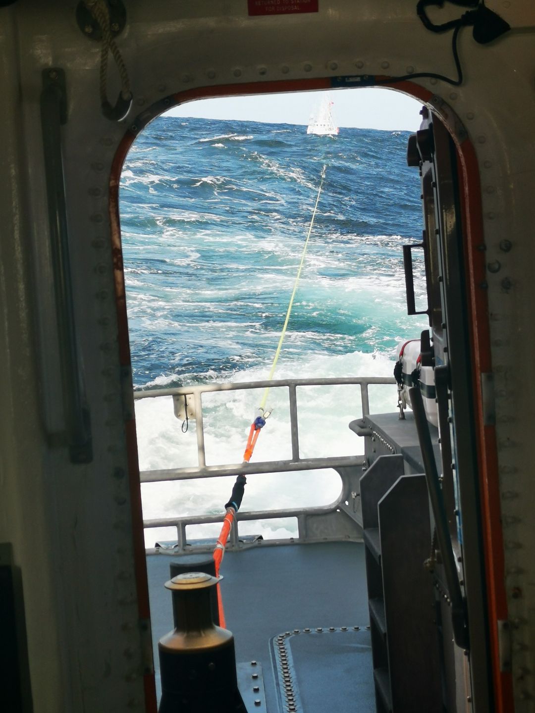 Taken from the stern showing the tow-line to the stricken fishing vessel.
