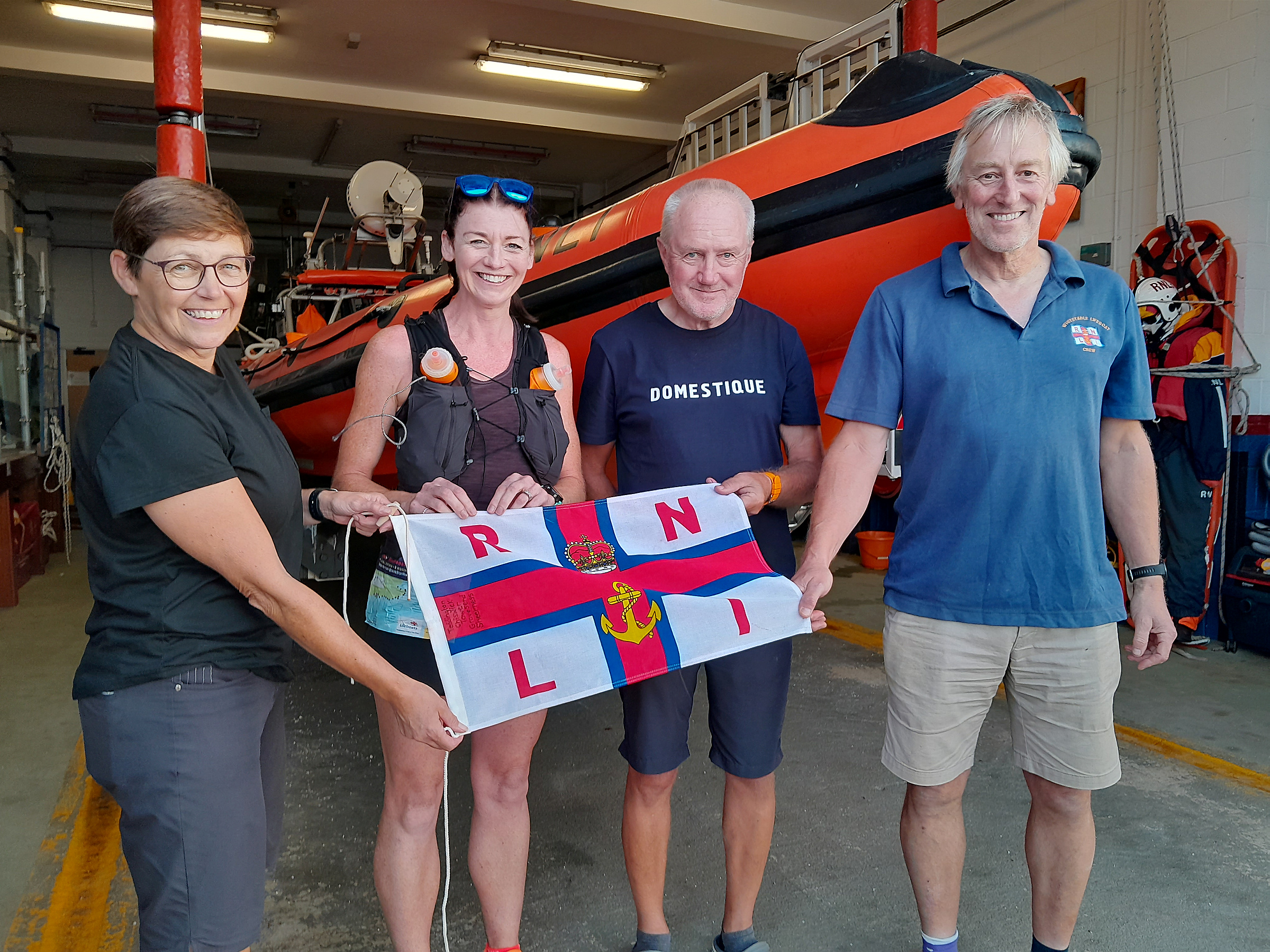 Emma Kirwin at Whitstable RNLI with Deputy Launching Authority Kellie Gray, left, Steve Gray(Social Media Officer) and Helmsman Dave Parry on Tuesday evening.