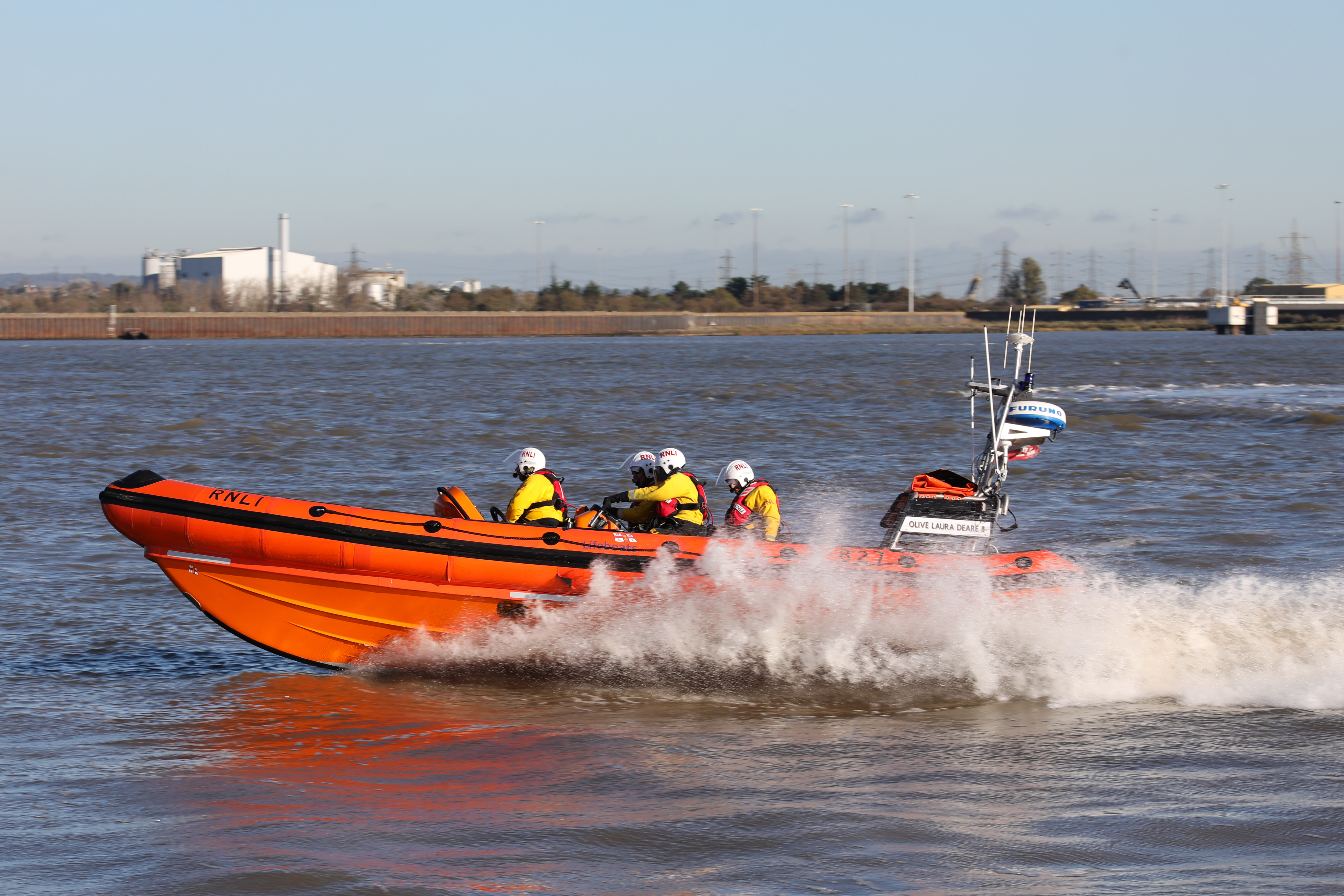 Gravesend RNLI's lifeboat travelling at speed on the River Thames
