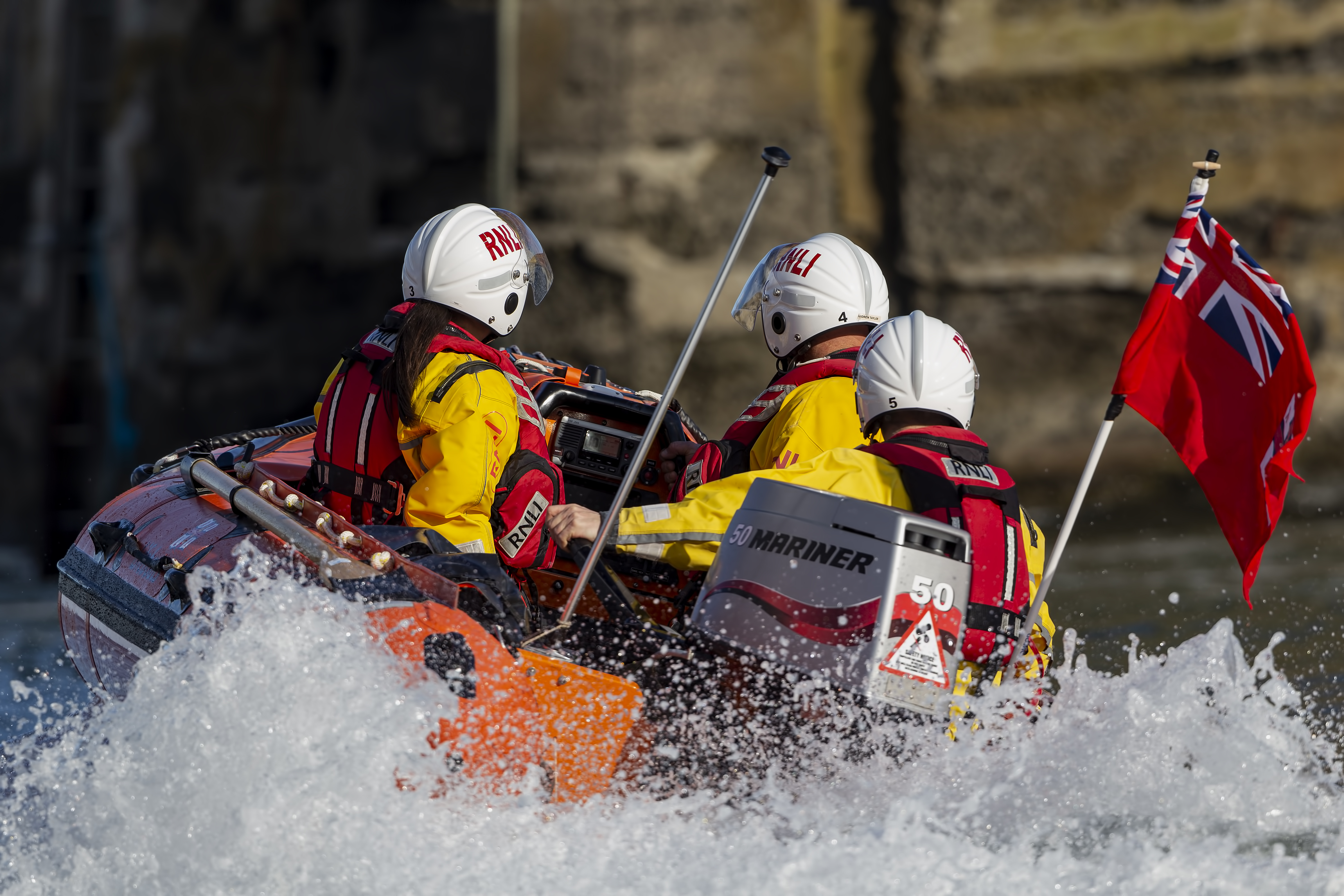 Stock image of lifeboat leaving the harbour 