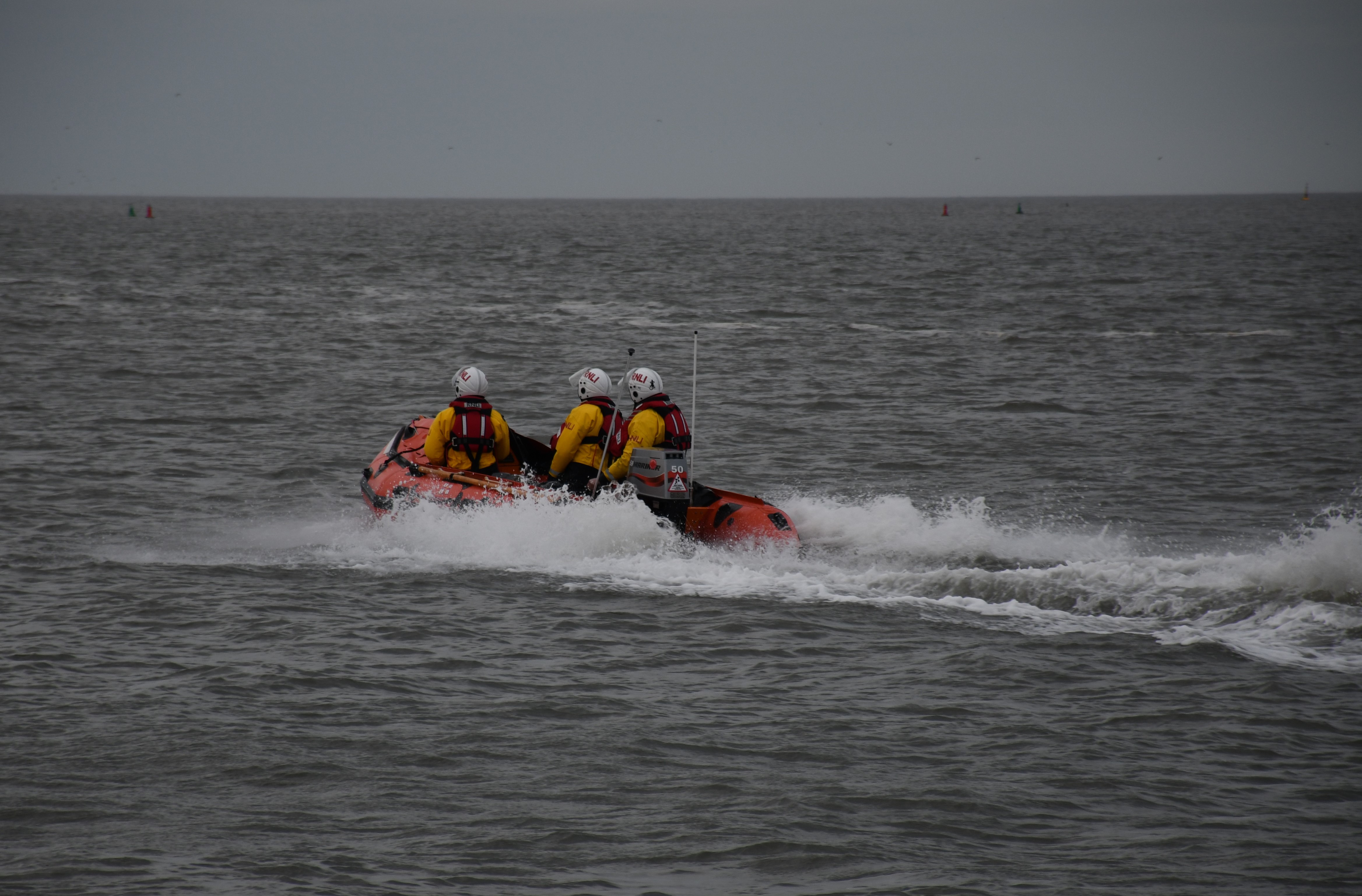 Wells RNLI D class lifeboat assists three people cut of by the tide 